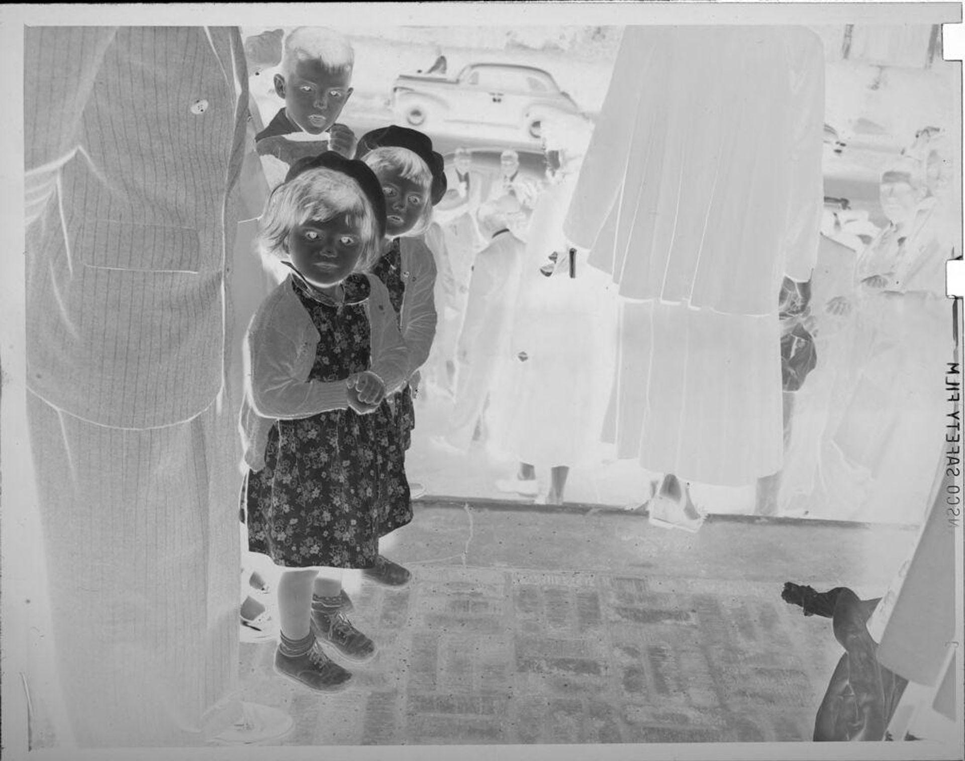 Untitled (two little girls in matching dresses and hats) by Lucian and Mary Brown