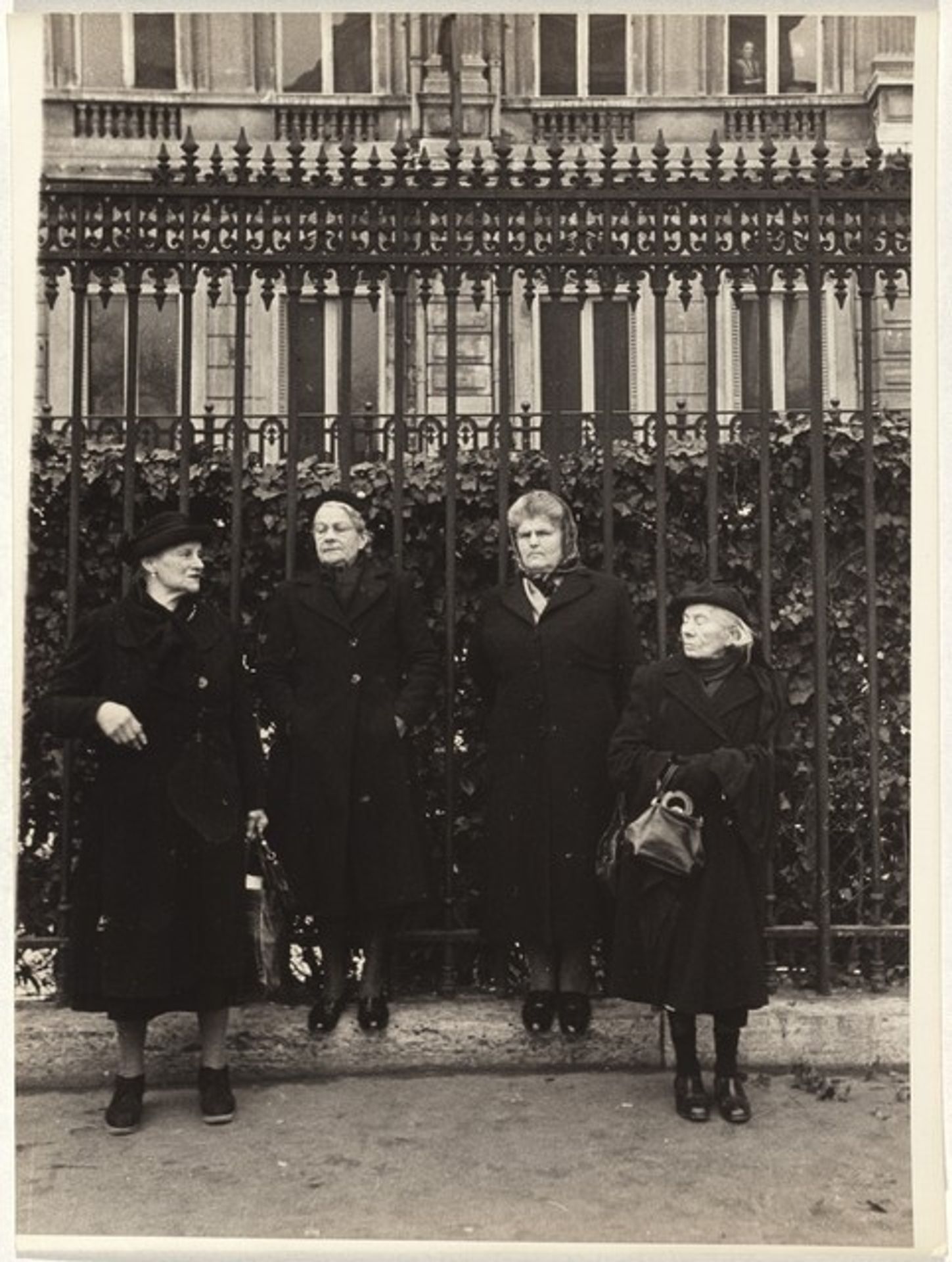 Four women before gate, Paris by Robert Frank