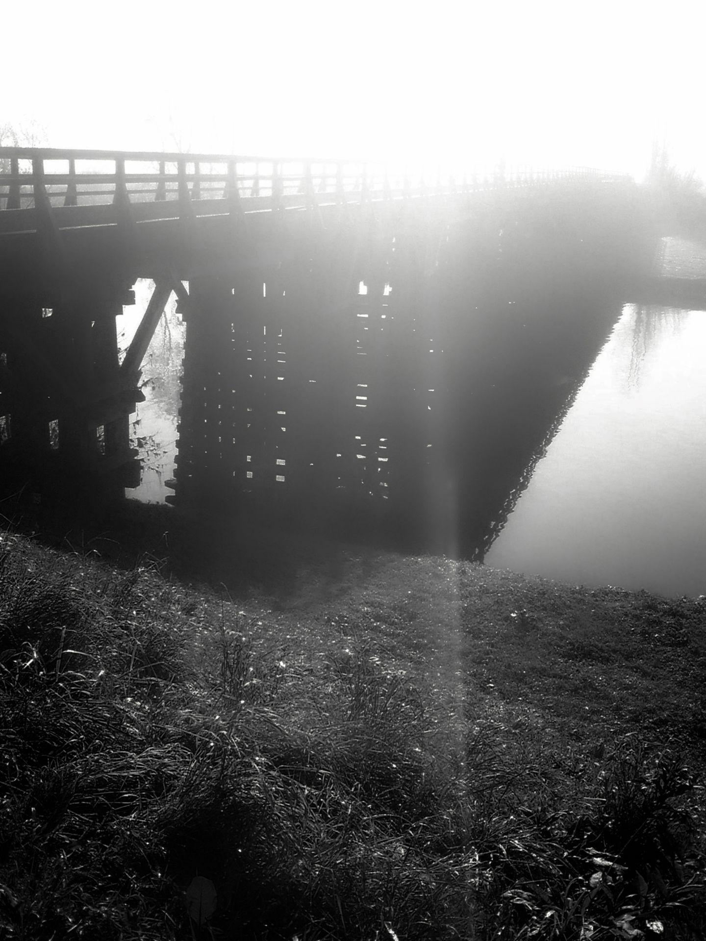 The wooden bridge at Korana river in early morning by Alfred Freddy Krupa