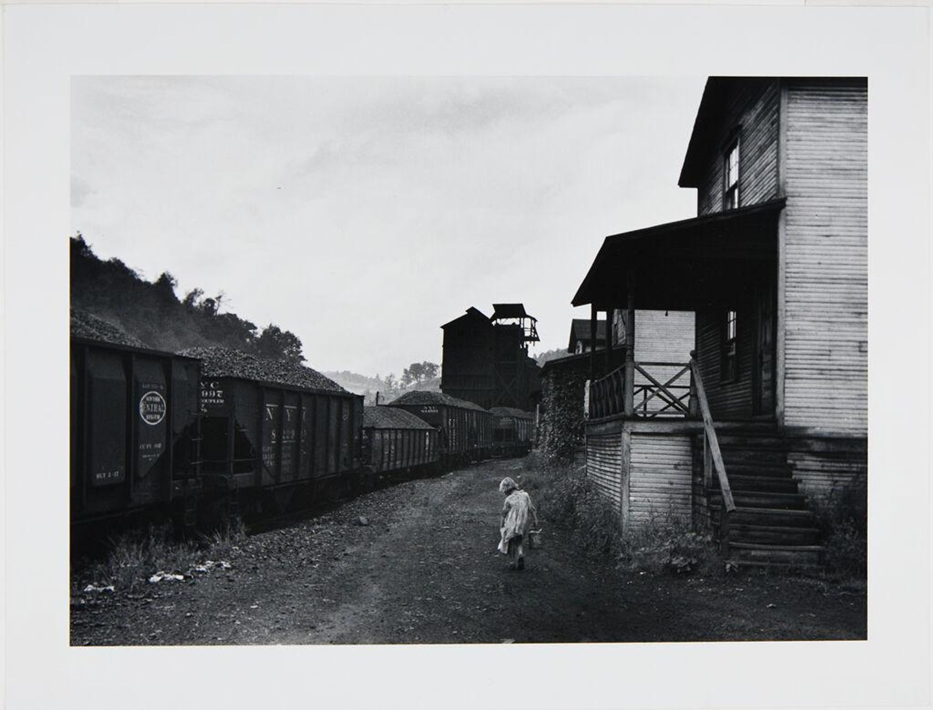 Coal Miner's Daughter Carrying Home a Can of Kerosene, Scotts Run, West Virginia by Marion Post Wolcott