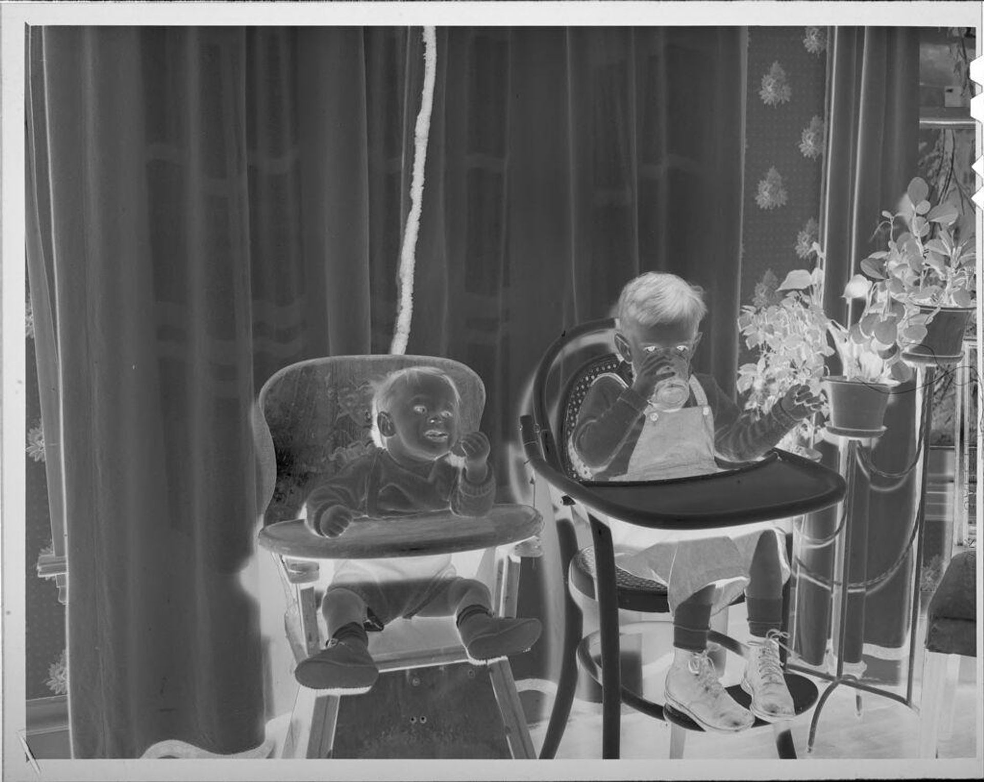 Untitled (two children in high chairs) by Lucian and Mary Brown