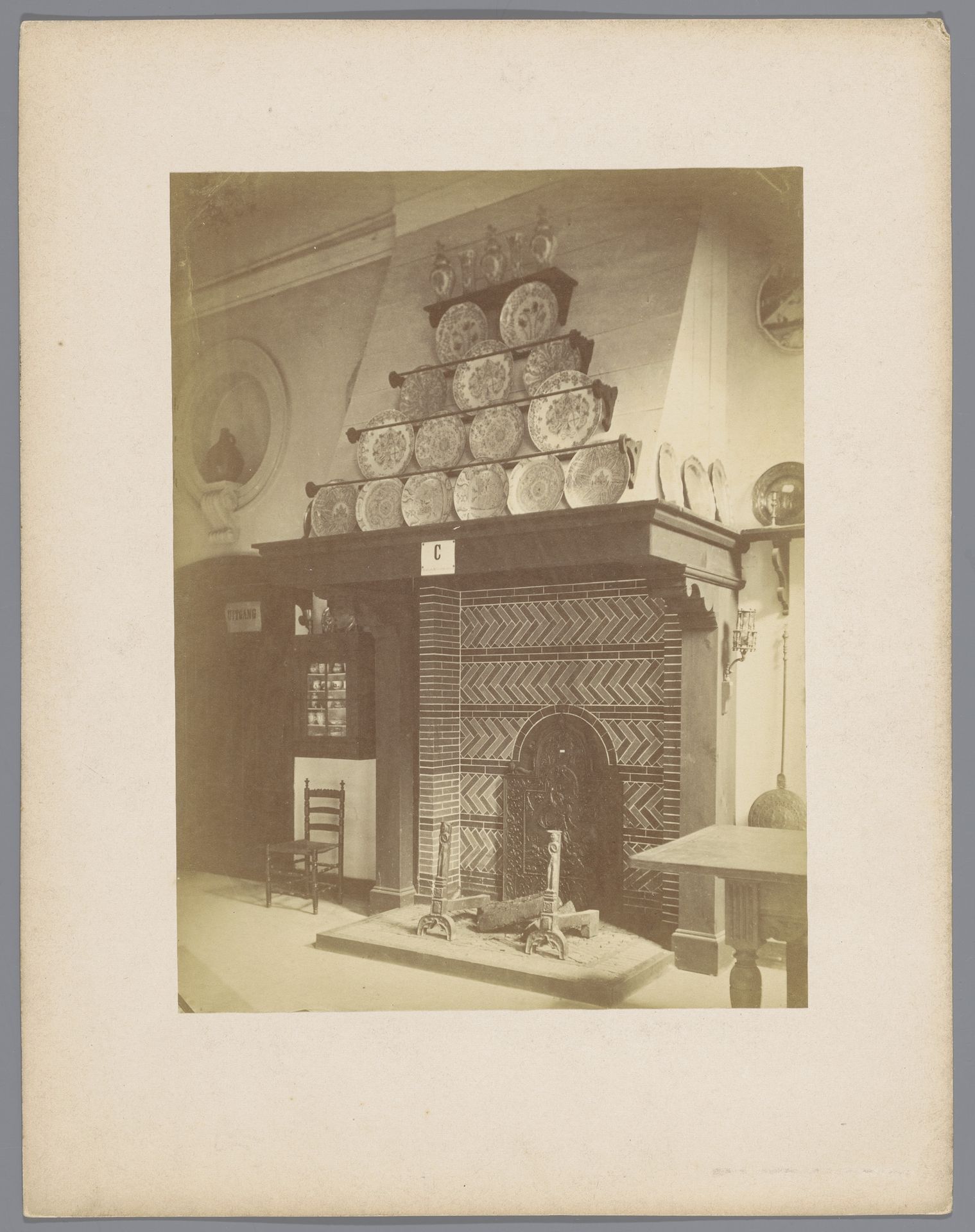 Schouw met daarop wandborden en een kaststel by P. Oosterhuis