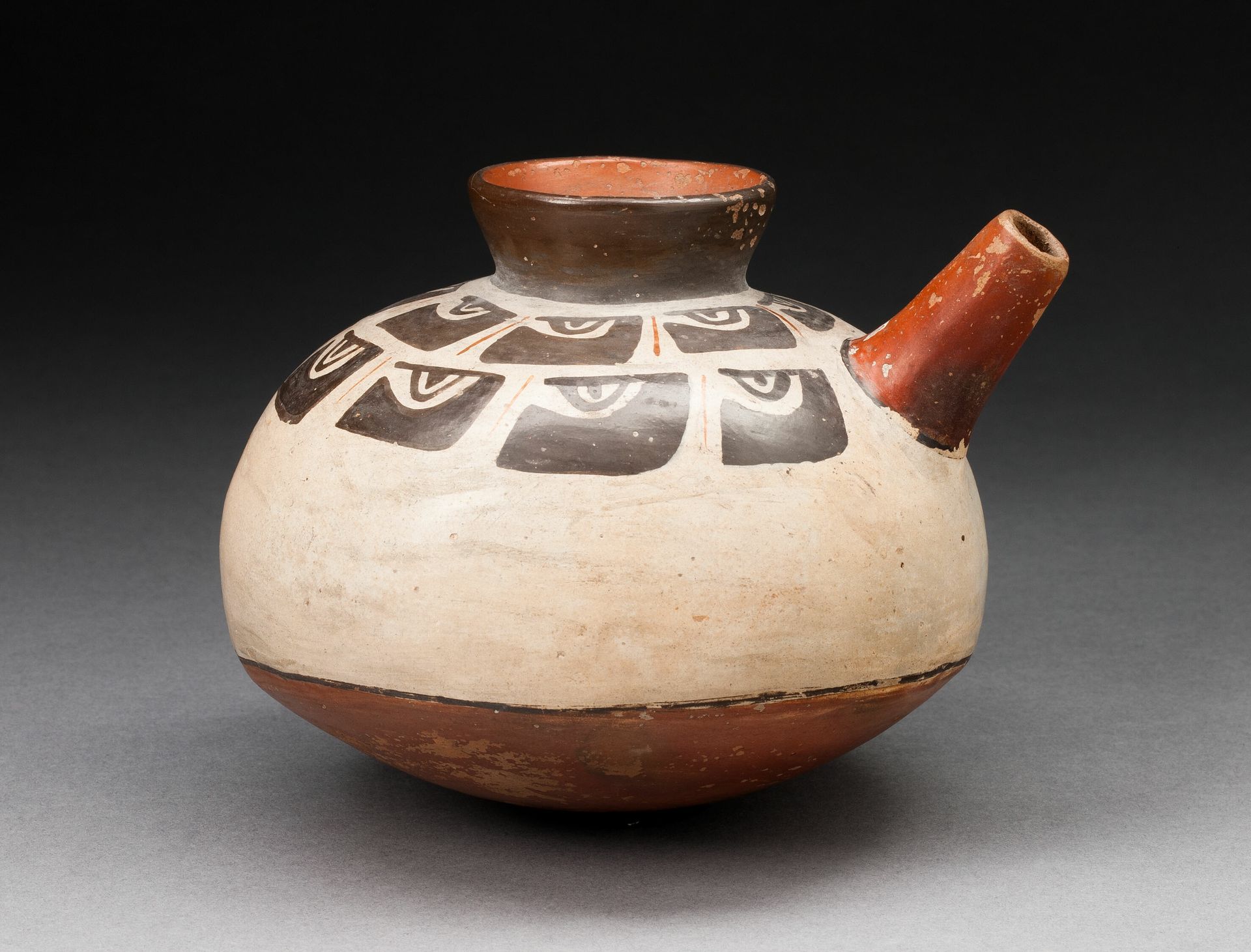 Spouted Jar with Repeated Abstract Motif by Nazca