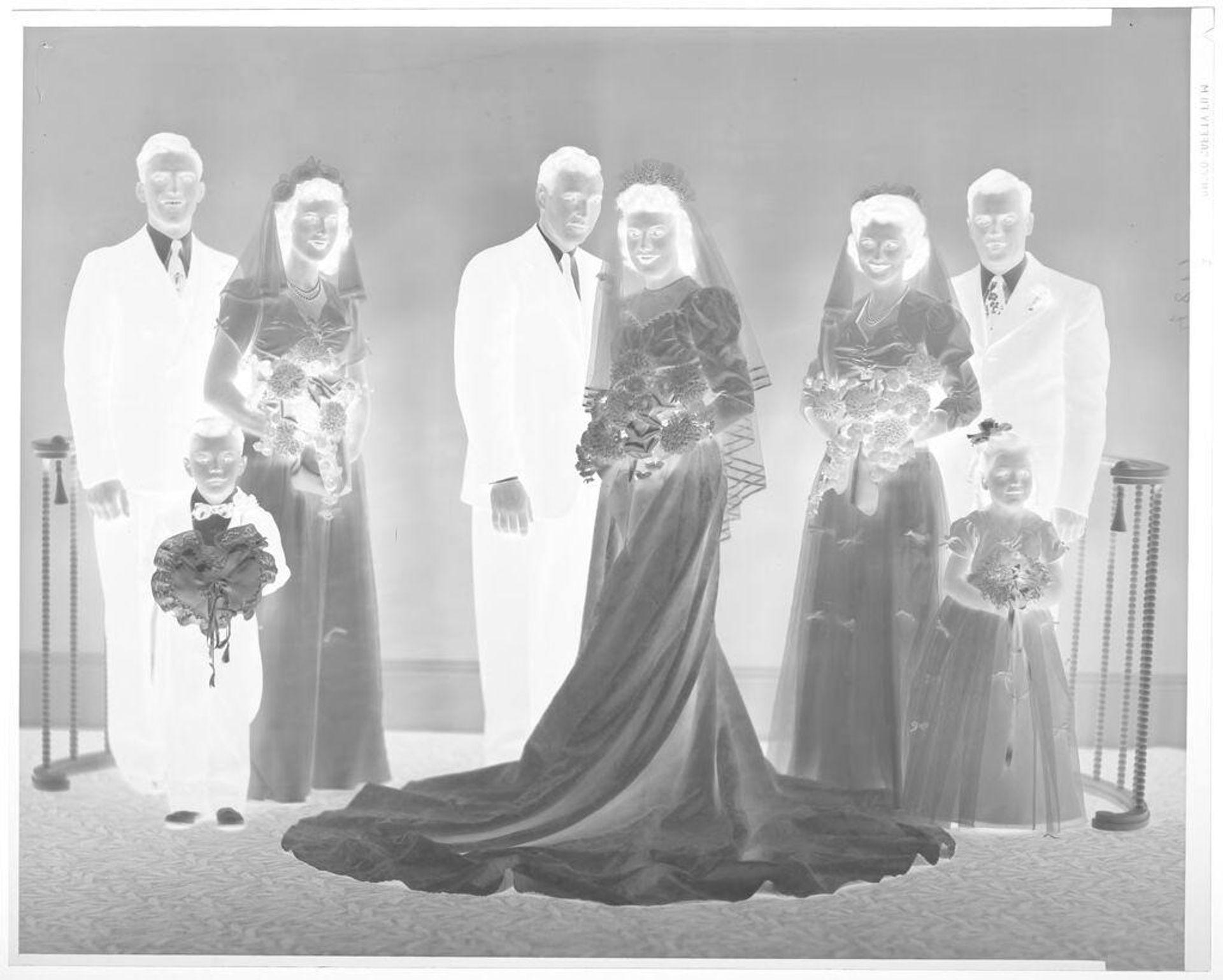 Untitled (bridal party posed in studio) by John Deusing