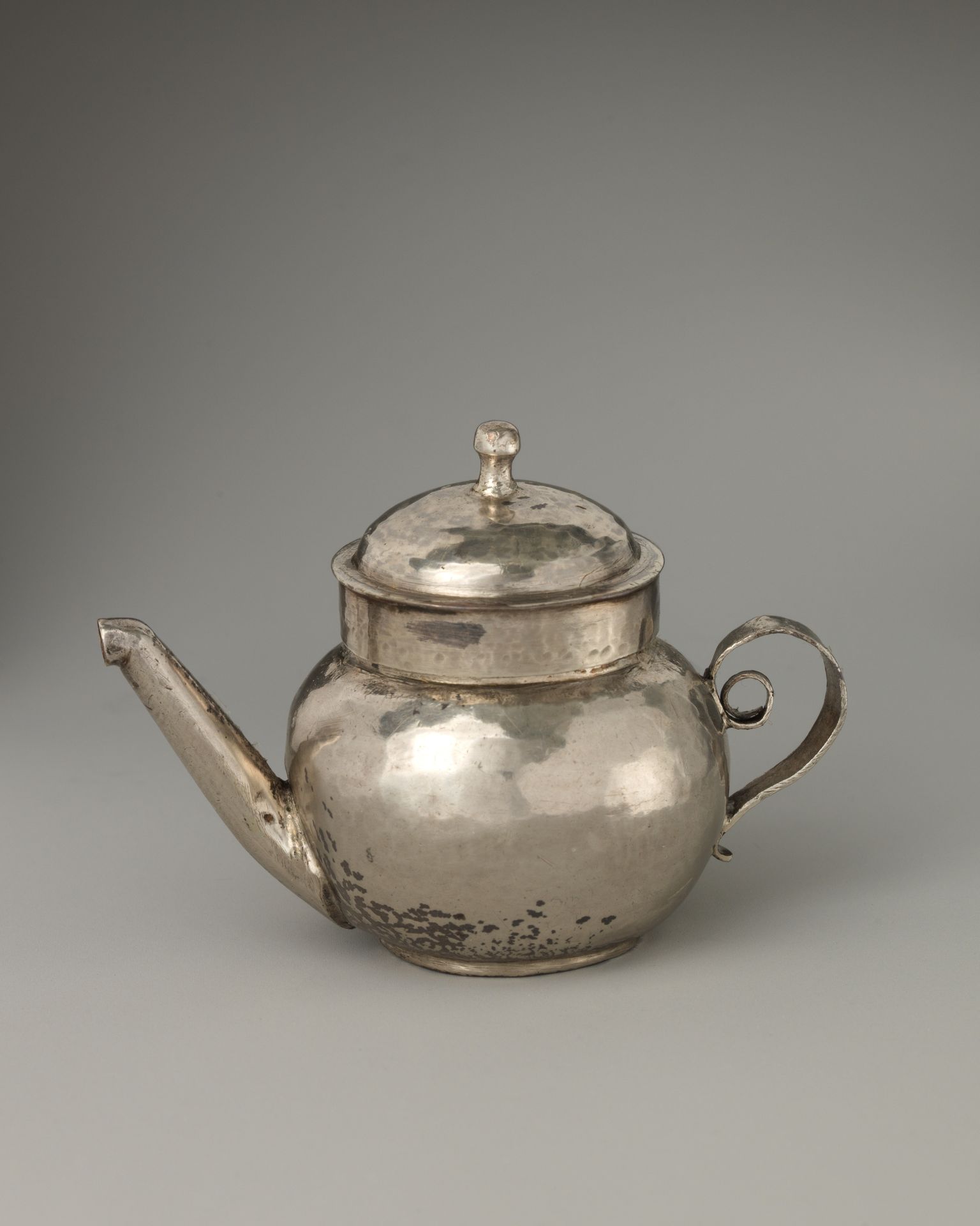Miniature teapot with cover by George Manjoy