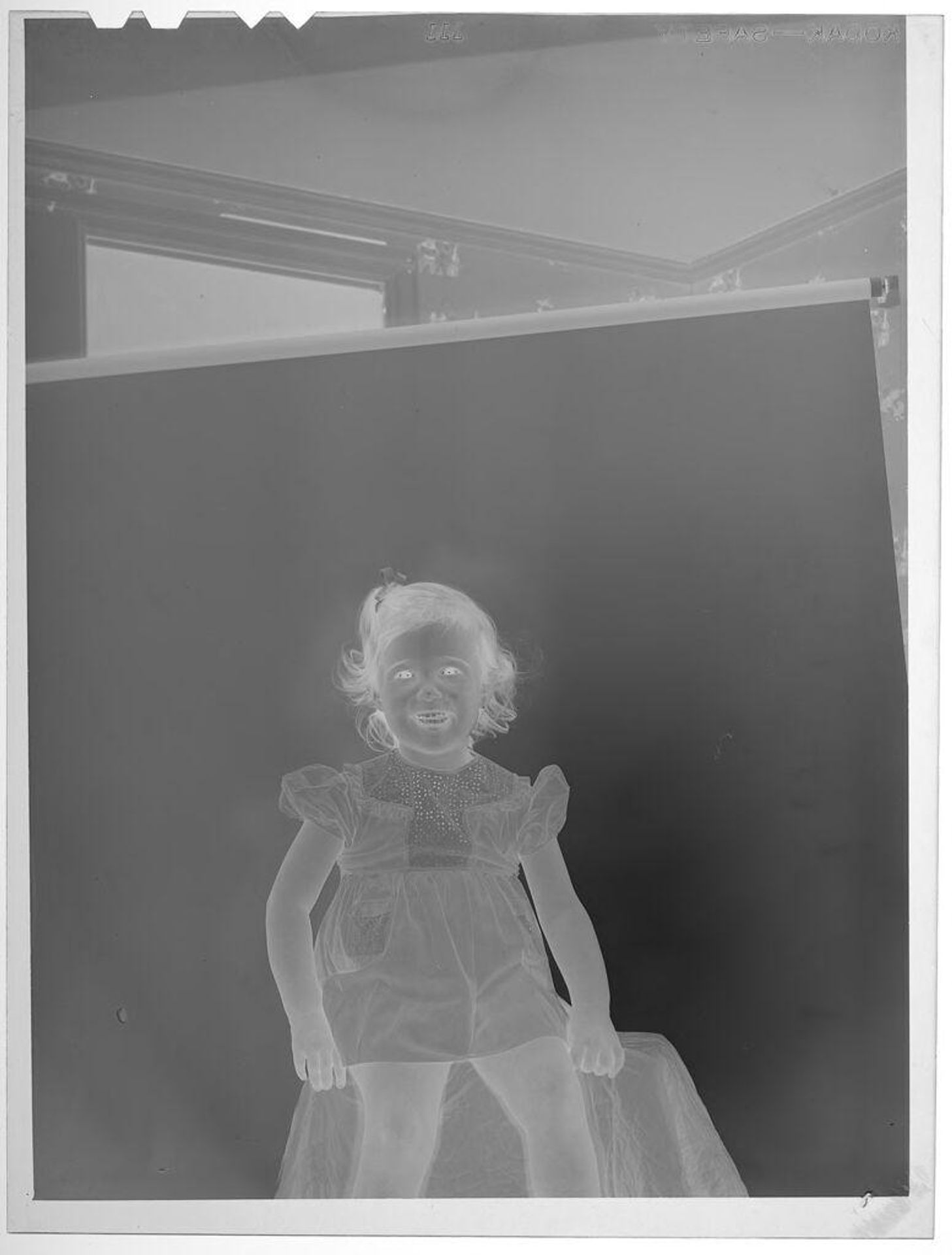 Untitled (smiling girl) by Lucian and Mary Brown
