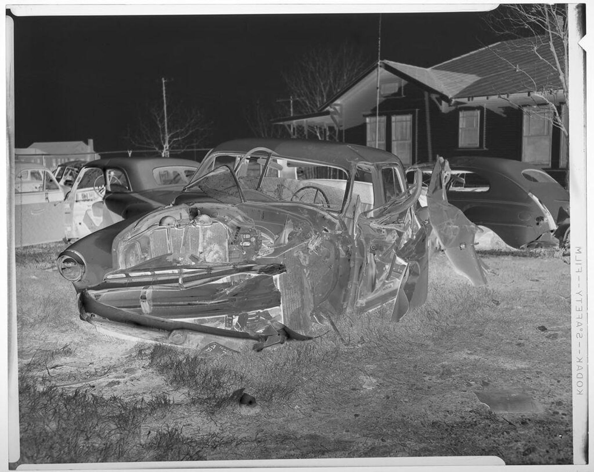 Untitled (wrecked car) by Harry Annas