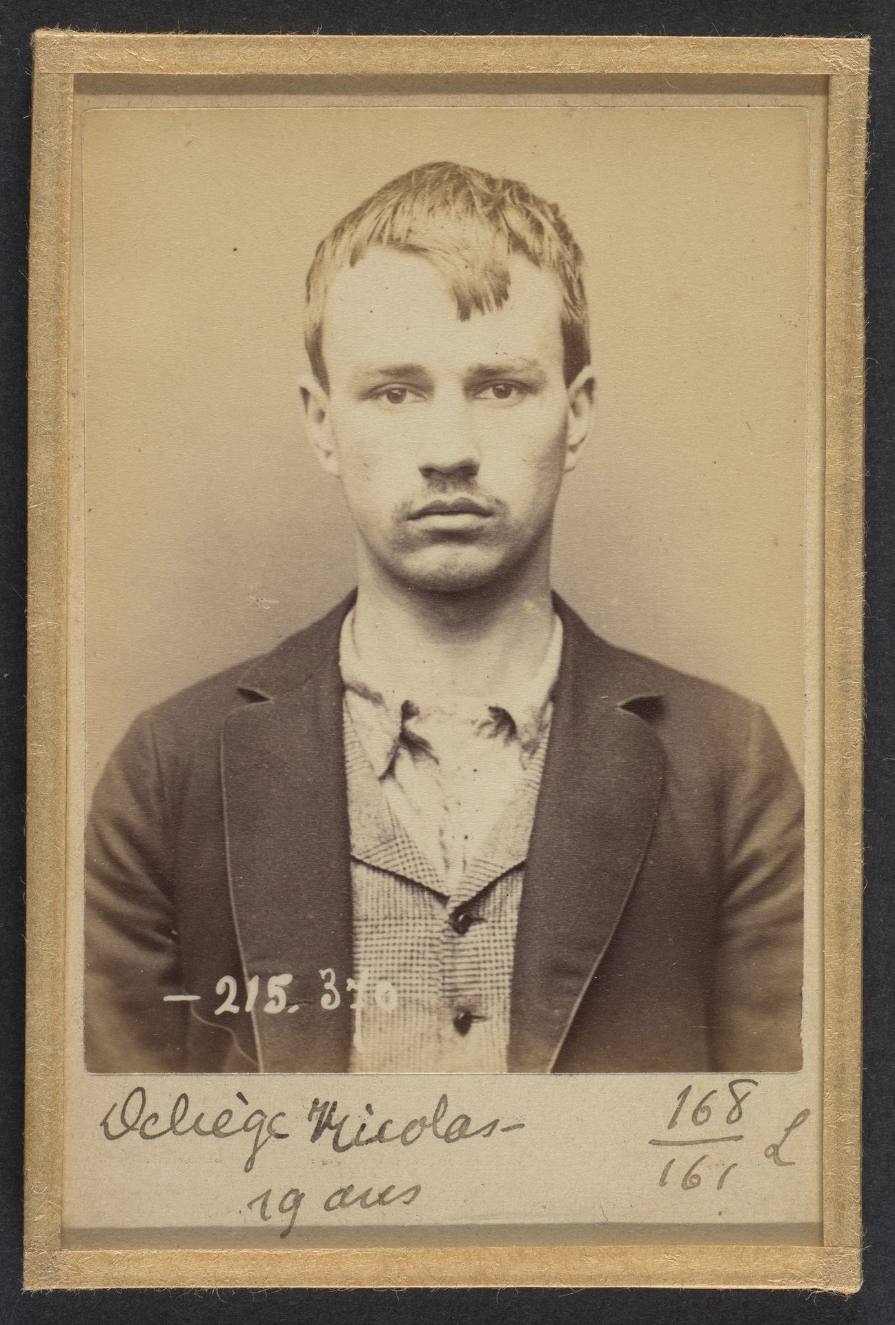 Deliège. Nicolas, François. 19 ans, né à Ixelles (Belgique). Tailleur d'habits. Anarchiste. 9/3/94. by Alphonse Bertillon