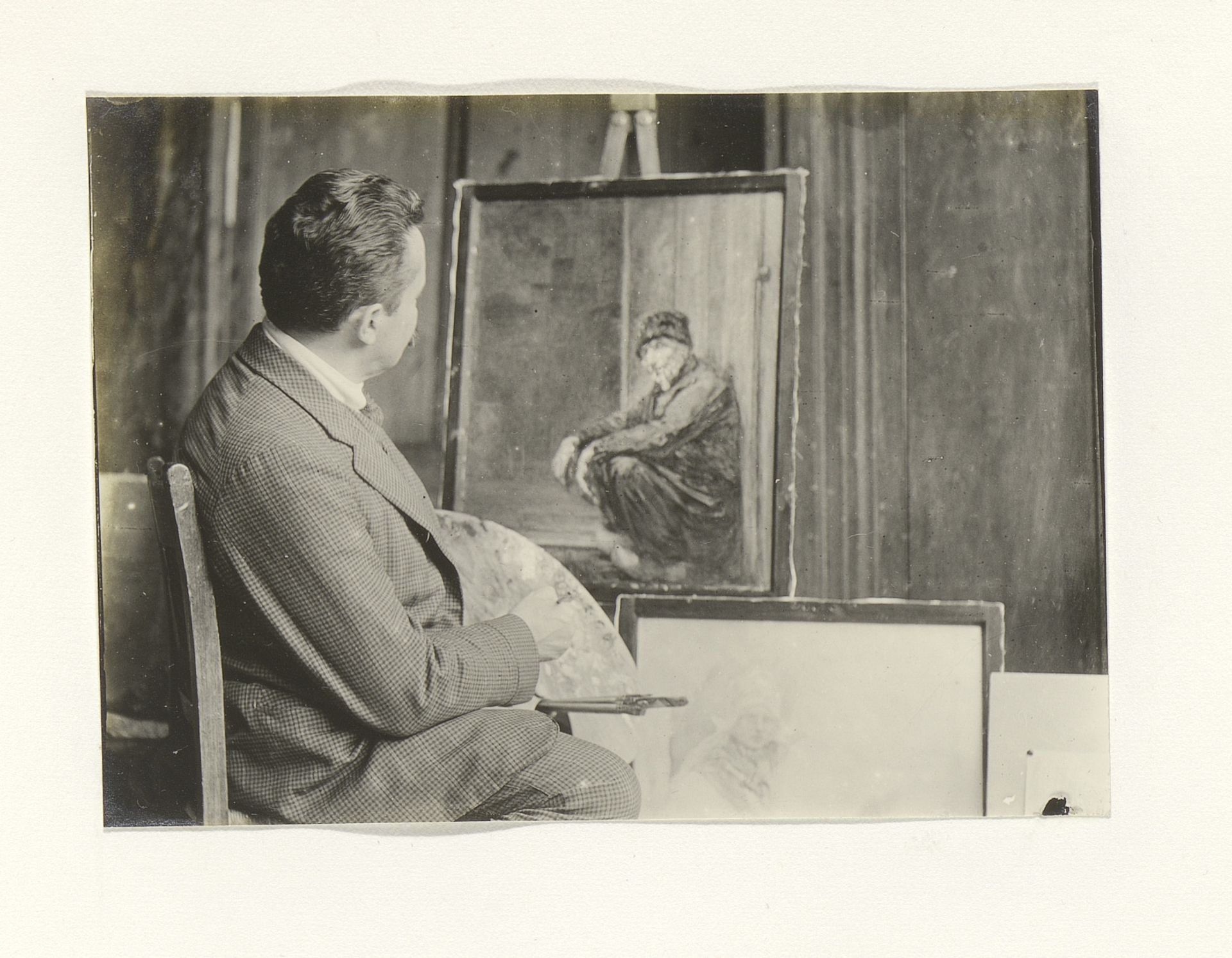 Man in een schildersatelier by G. Hidderley