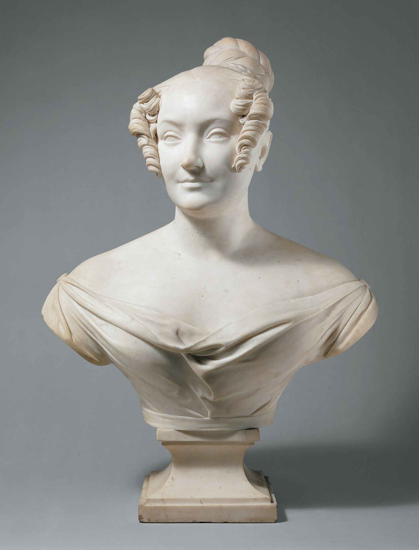 Bust of a young woman by Jean-Pierre Dantan
