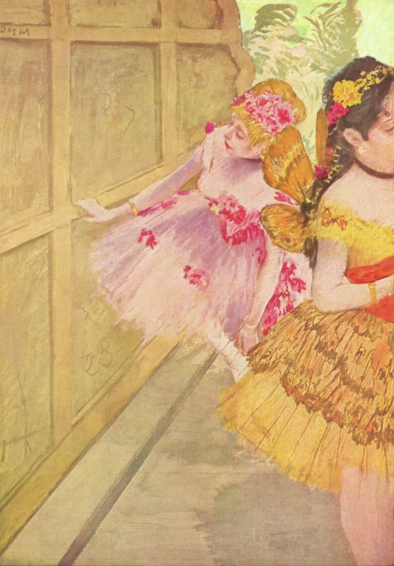 Dancer against a stage flat by Edgar Degas