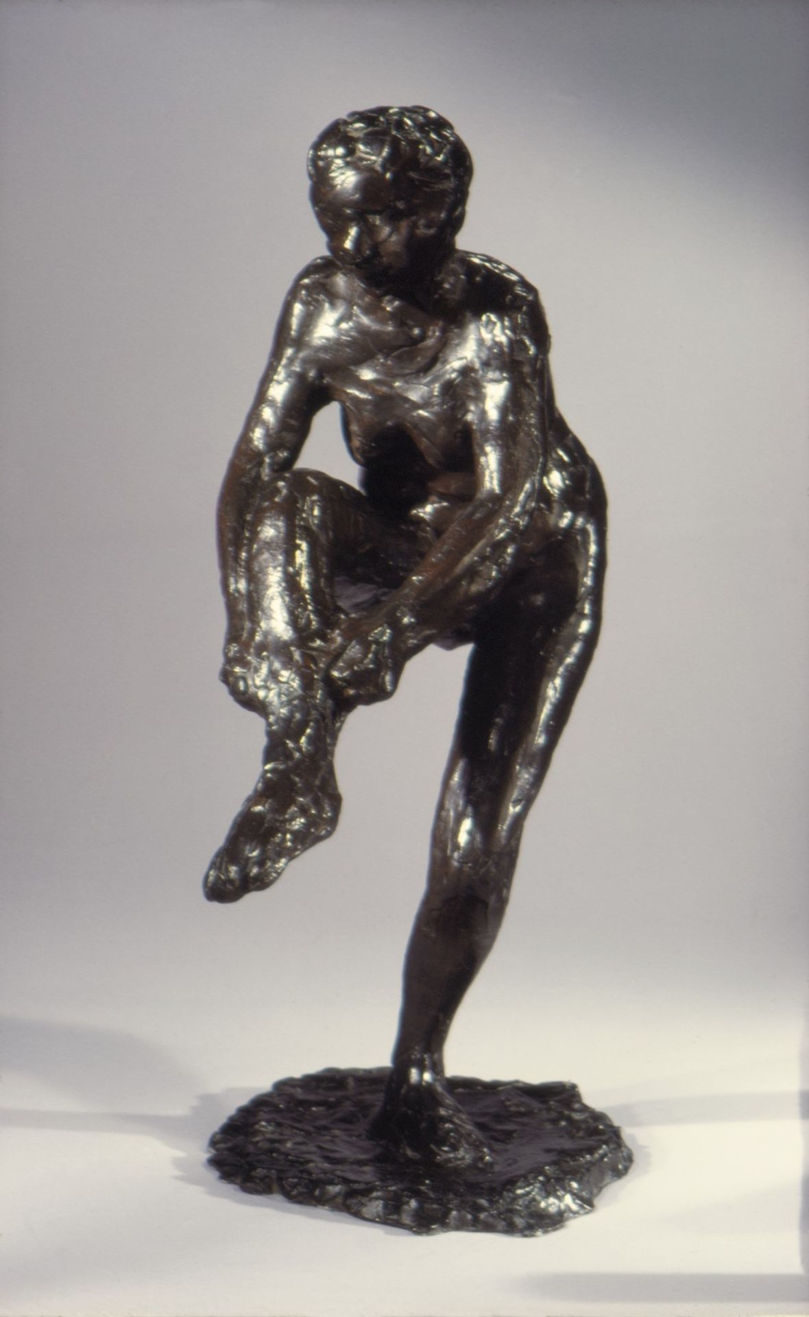 Dancer Putting on Her Stocking (Third State) by Edgar Degas