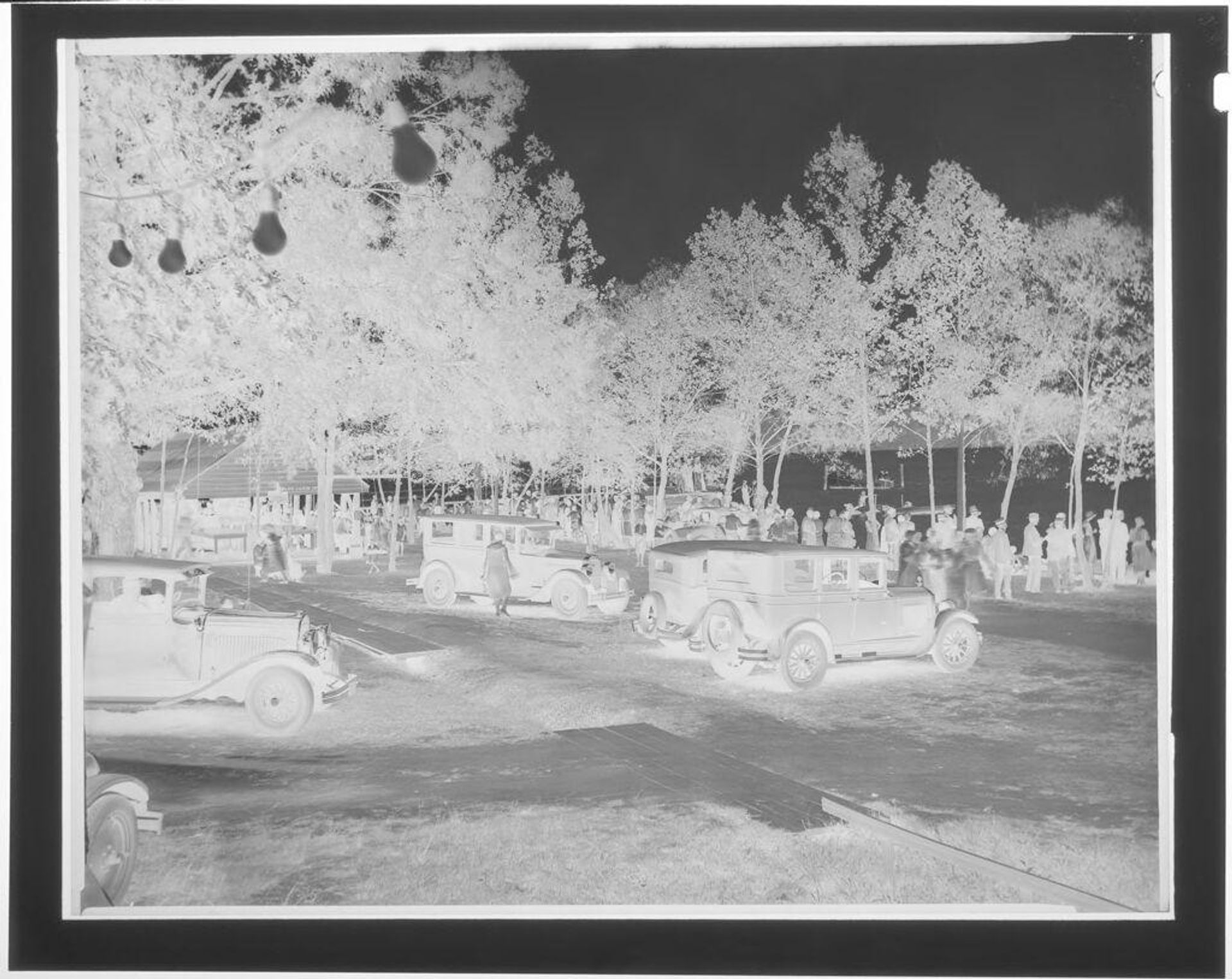 Untitled (cars parked at Tuscanora Beach) by Hamblin Studio