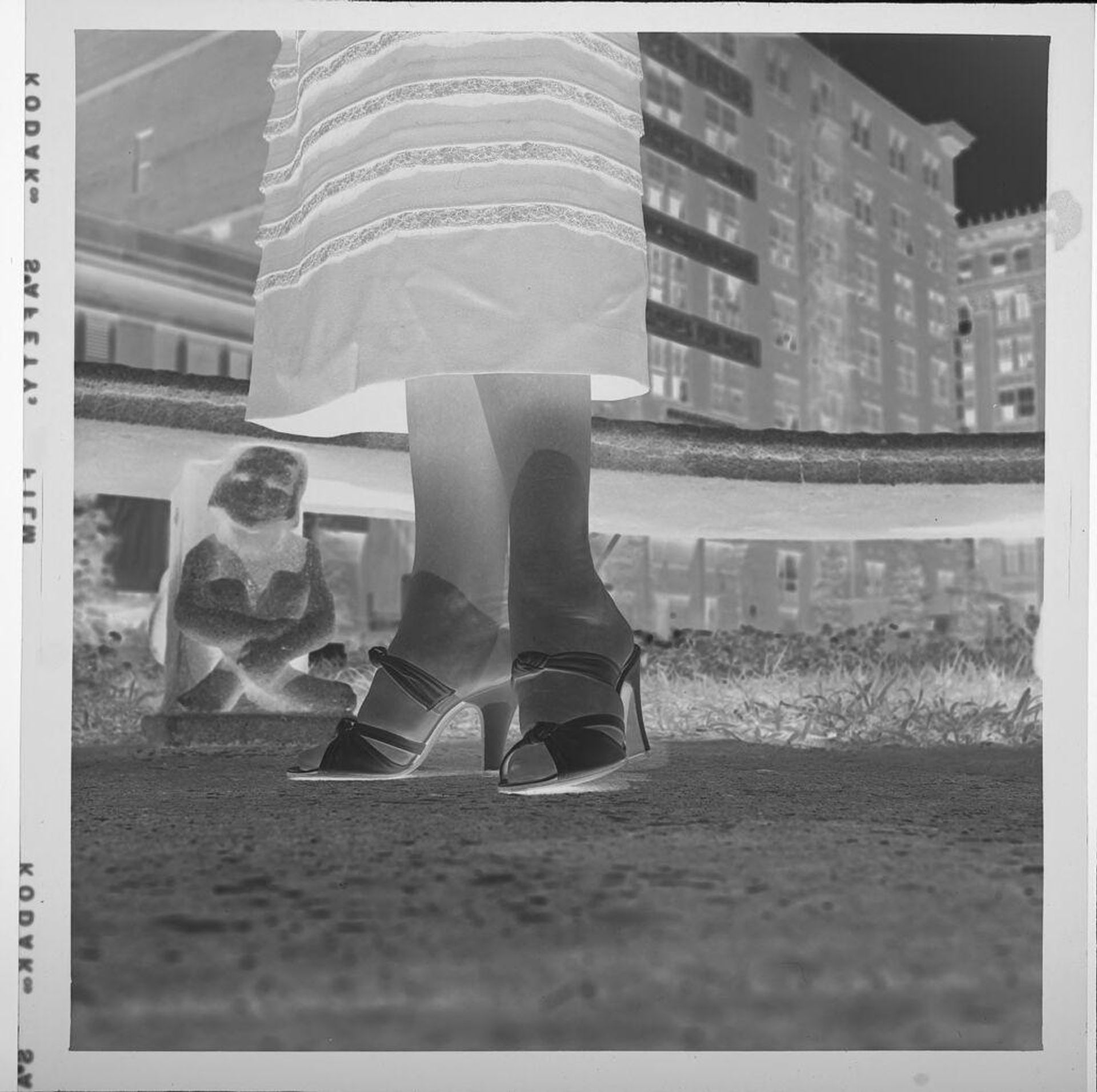 Untitled (woman's lower legs and feet) by Jack Gould