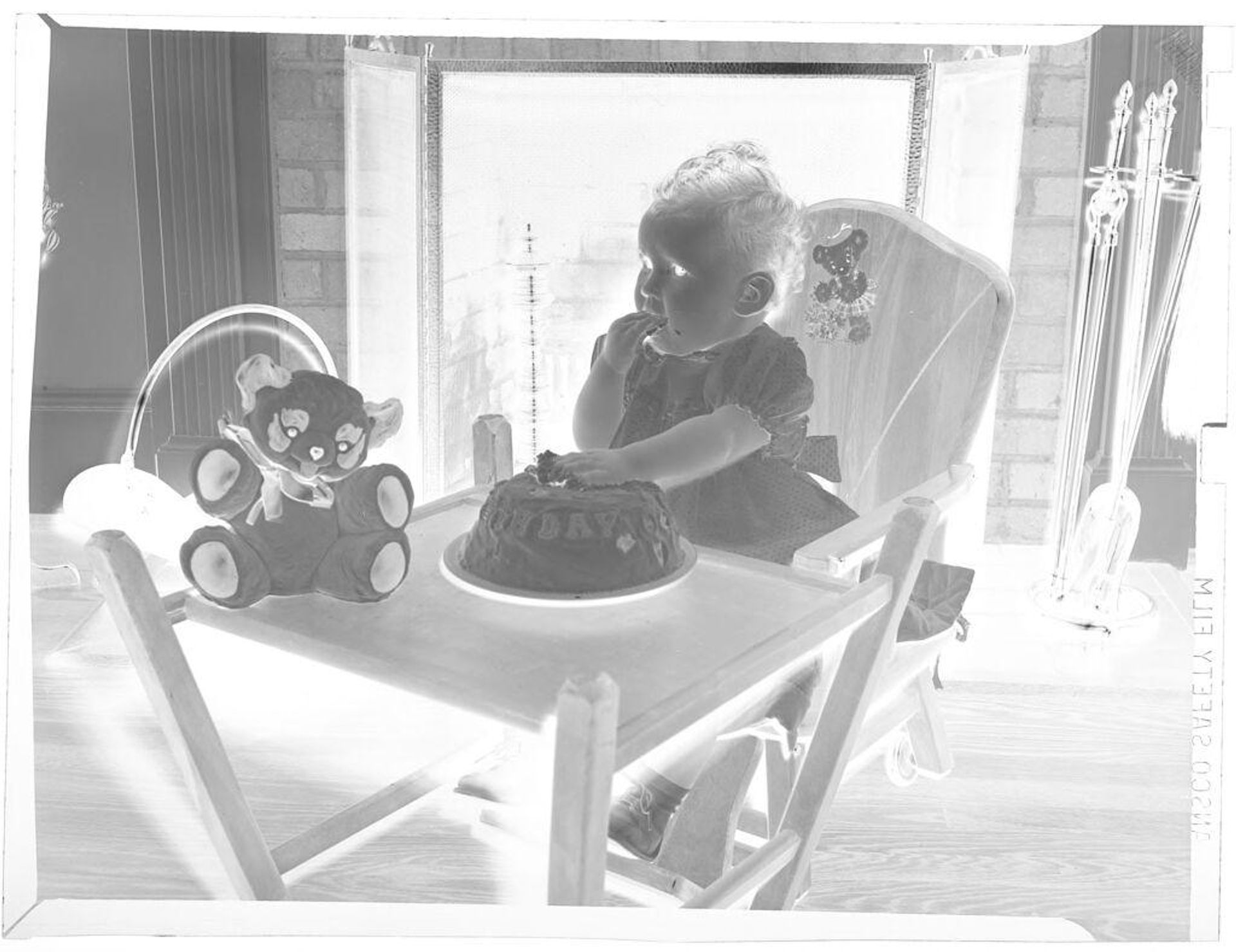 Untitled (one-year old eating birthday cake) by Hamblin Studio