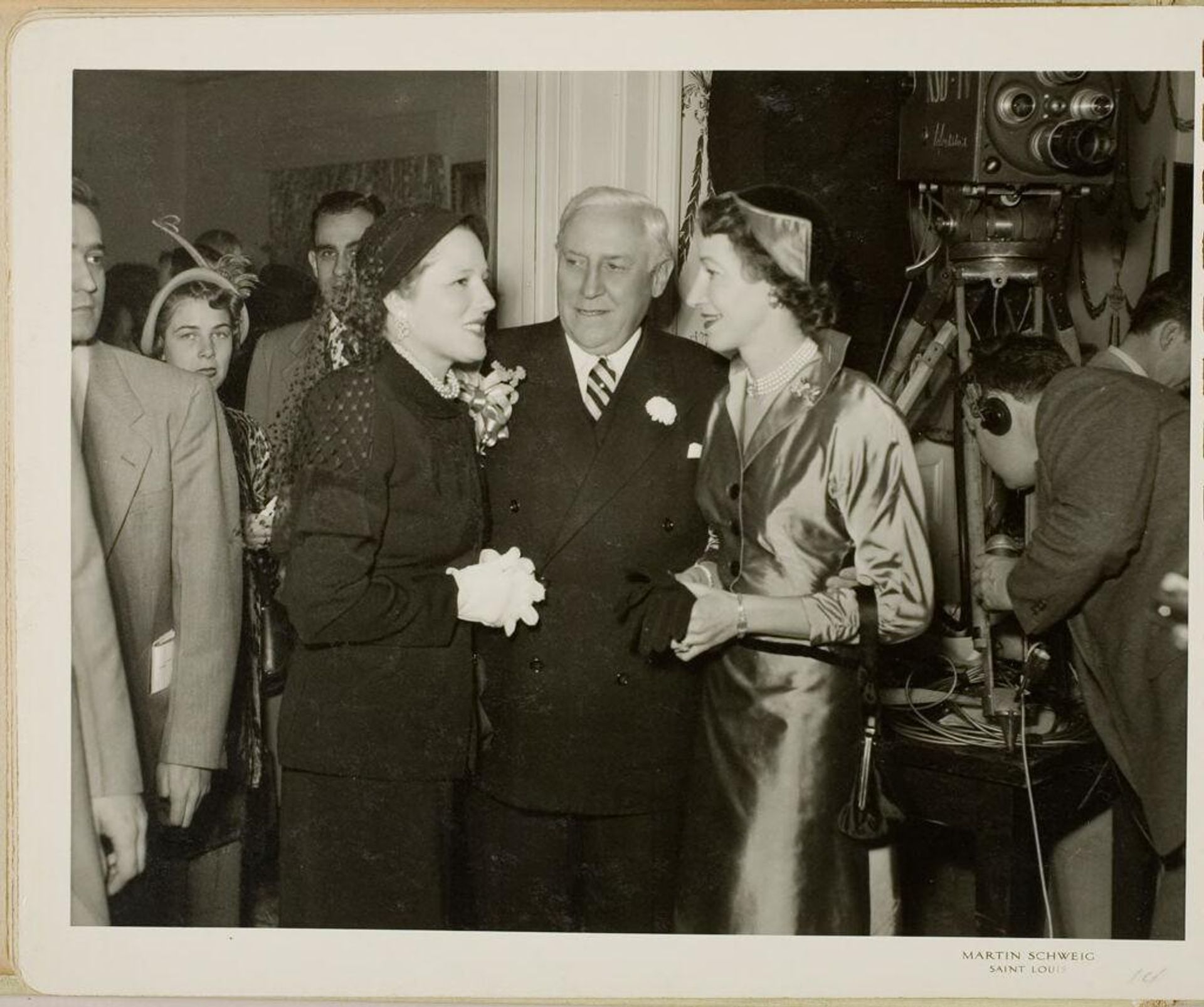 Untitled (guests standing near TV camera) by Martin Schweig