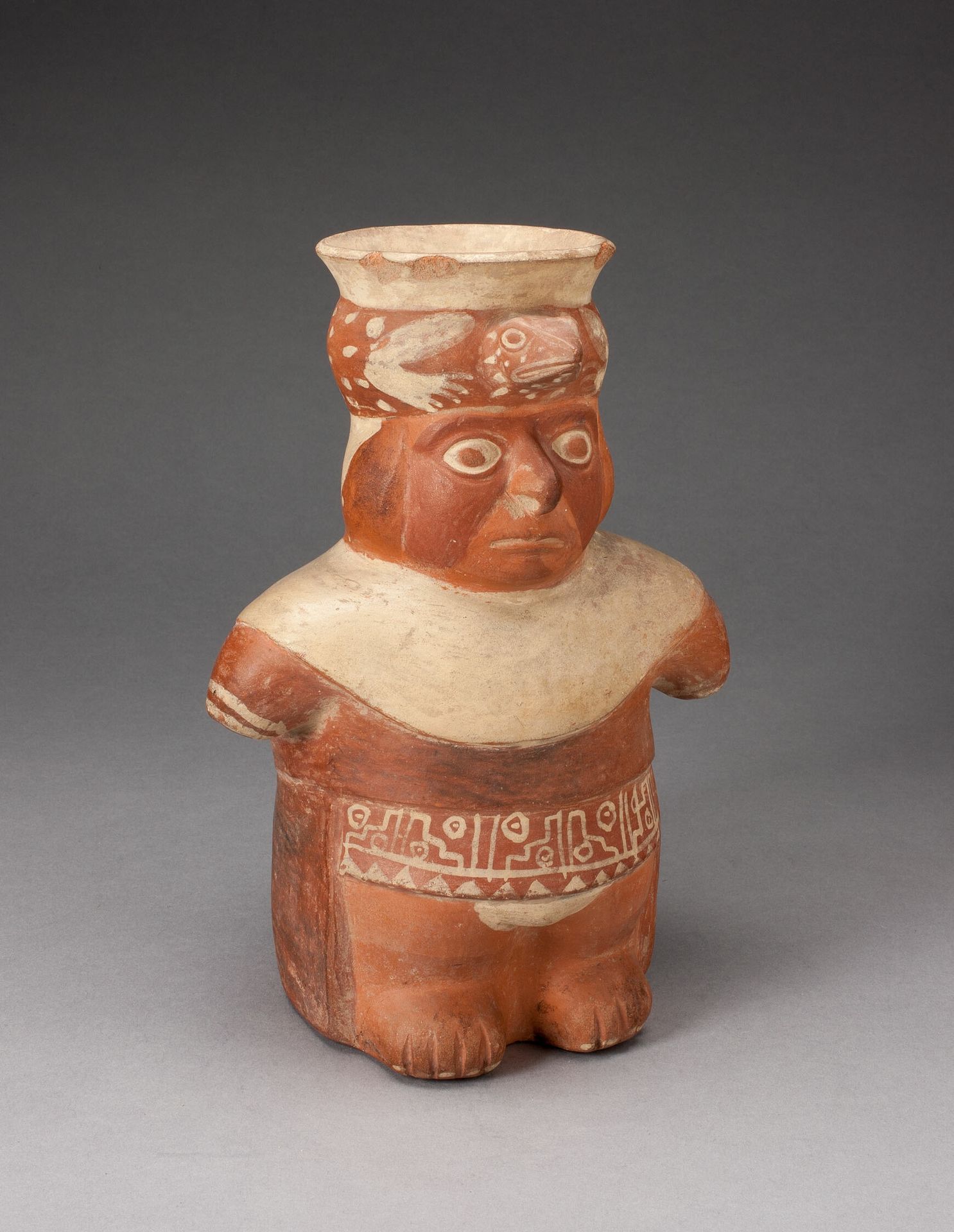Jar in the Form of a Figure with Patterned Waistband and Lizard Headdress by Moche