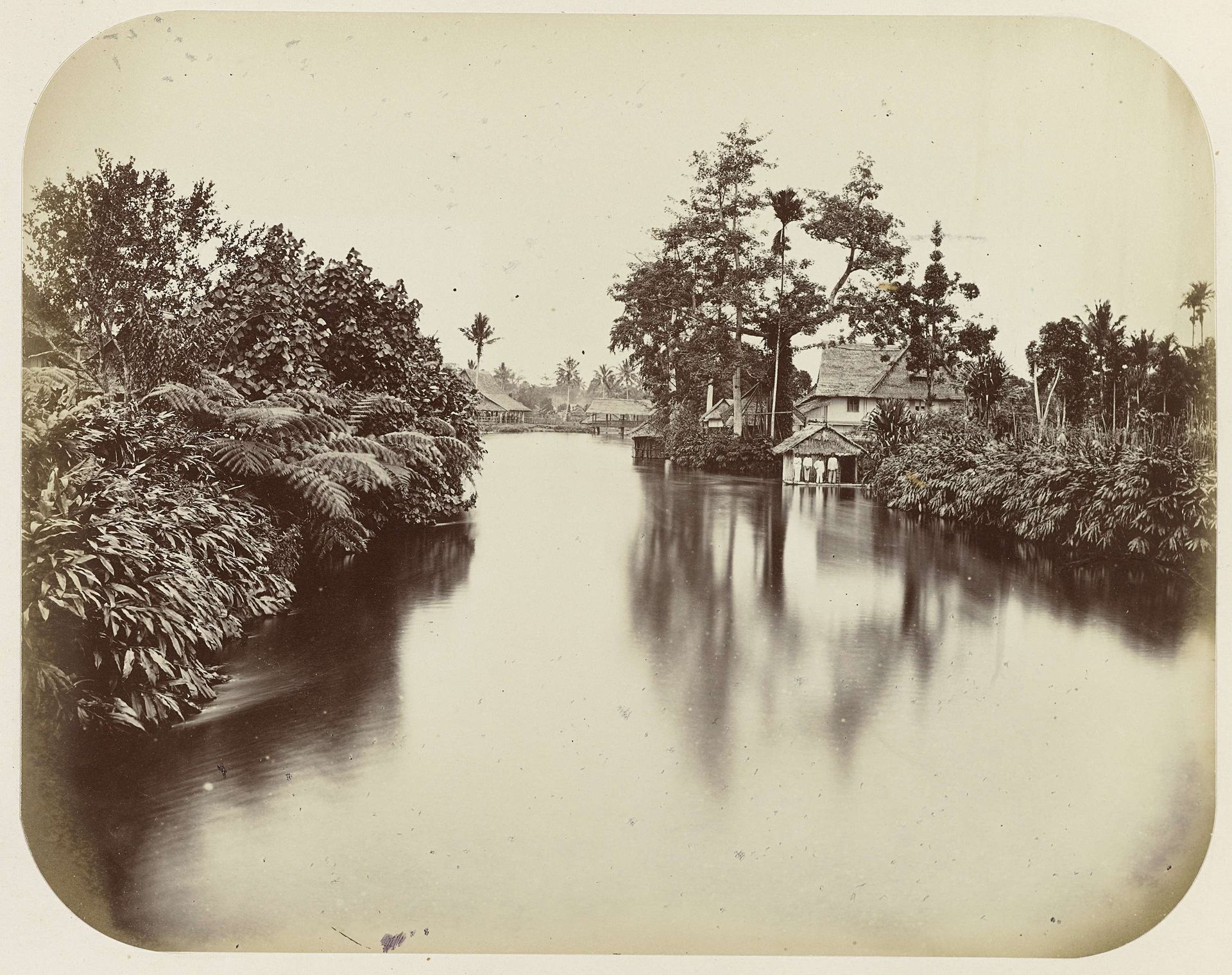 Huizen aan de Tondano te Manado by Woodbury & Page