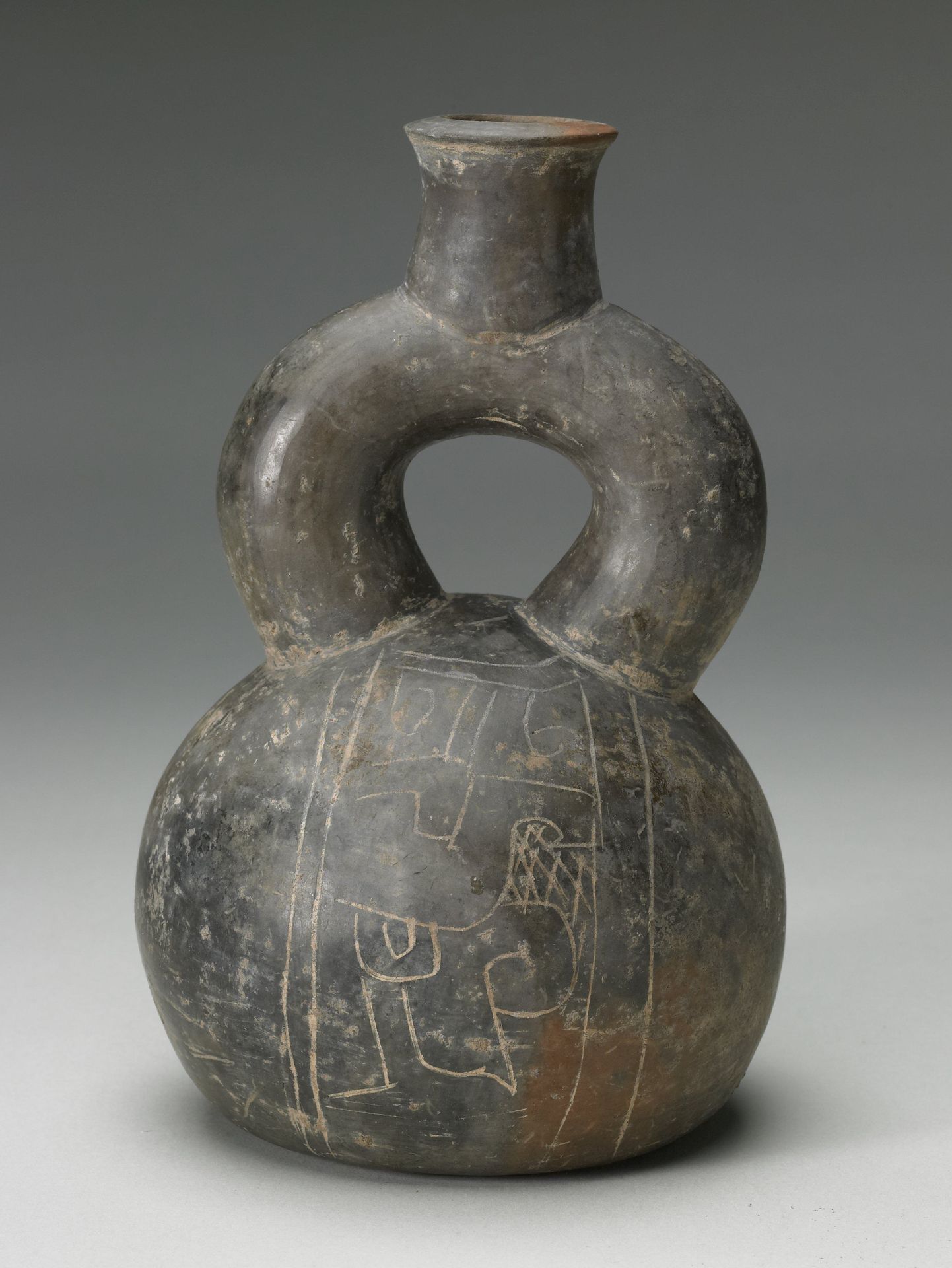 Stirrup vessel with Jaguar designs by Chavín
