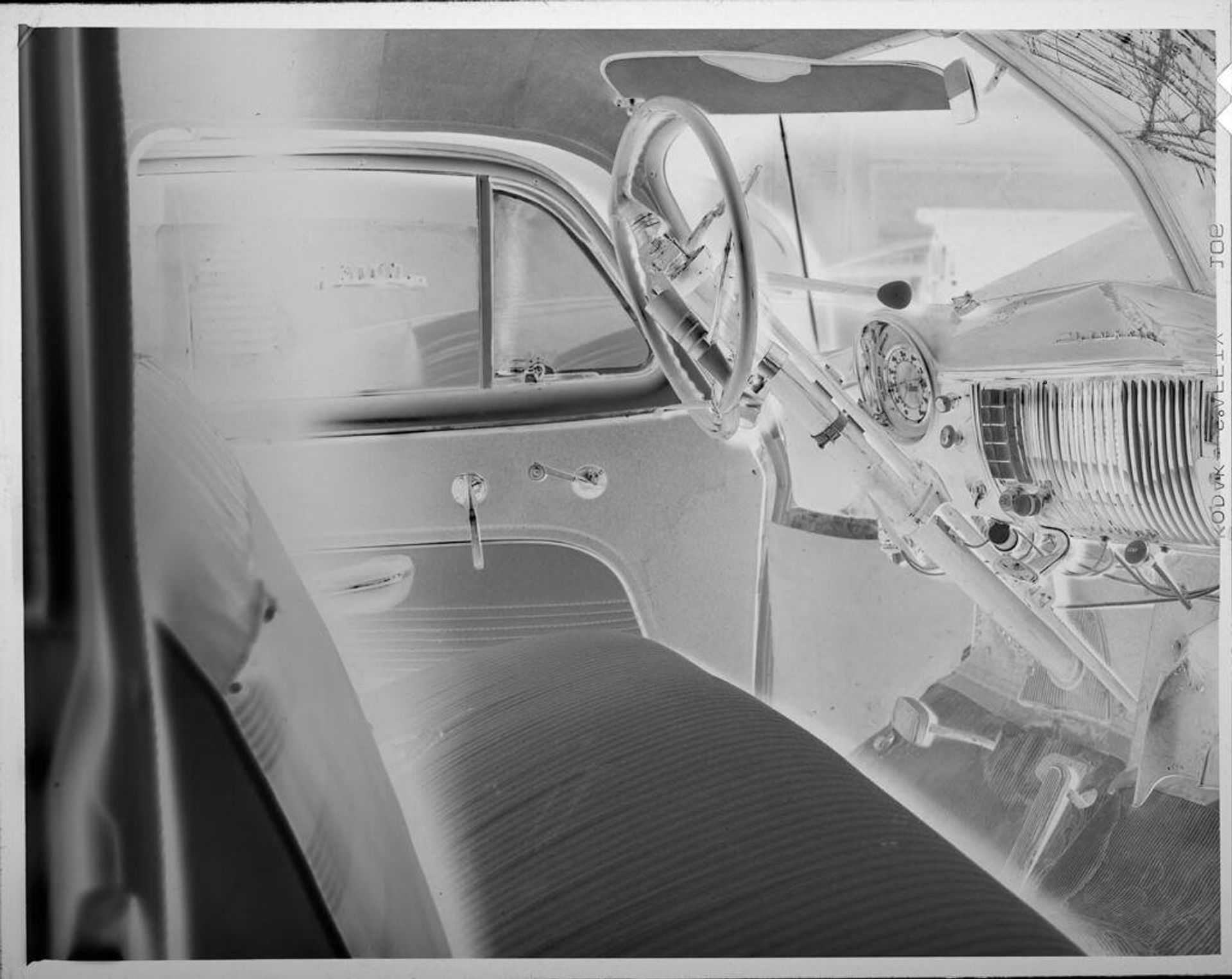 Untitled (inside of car with cracked windshield) by Lucian and Mary Brown