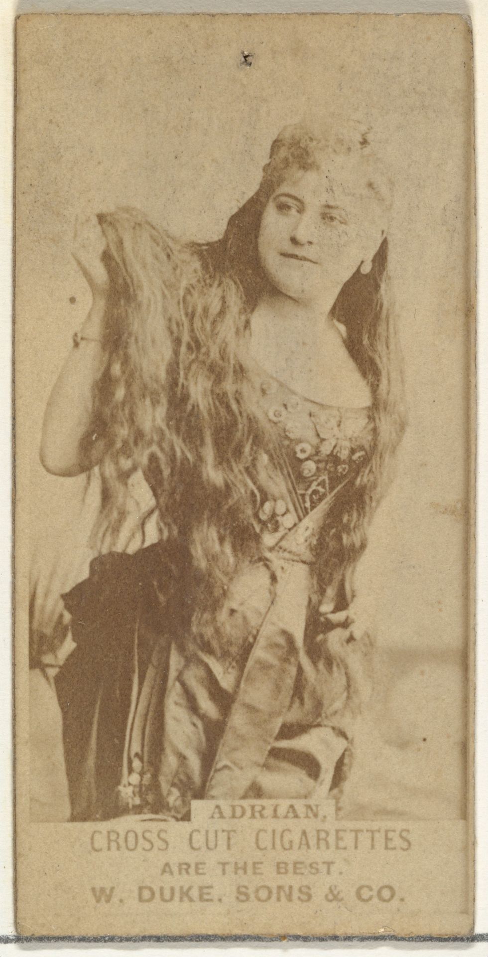 Adrian, from the Actors and Actresses series (N145-3) issued by Duke Sons & Co. to promote Cross Cut Cigarettes by W. Duke, Sons & Co.