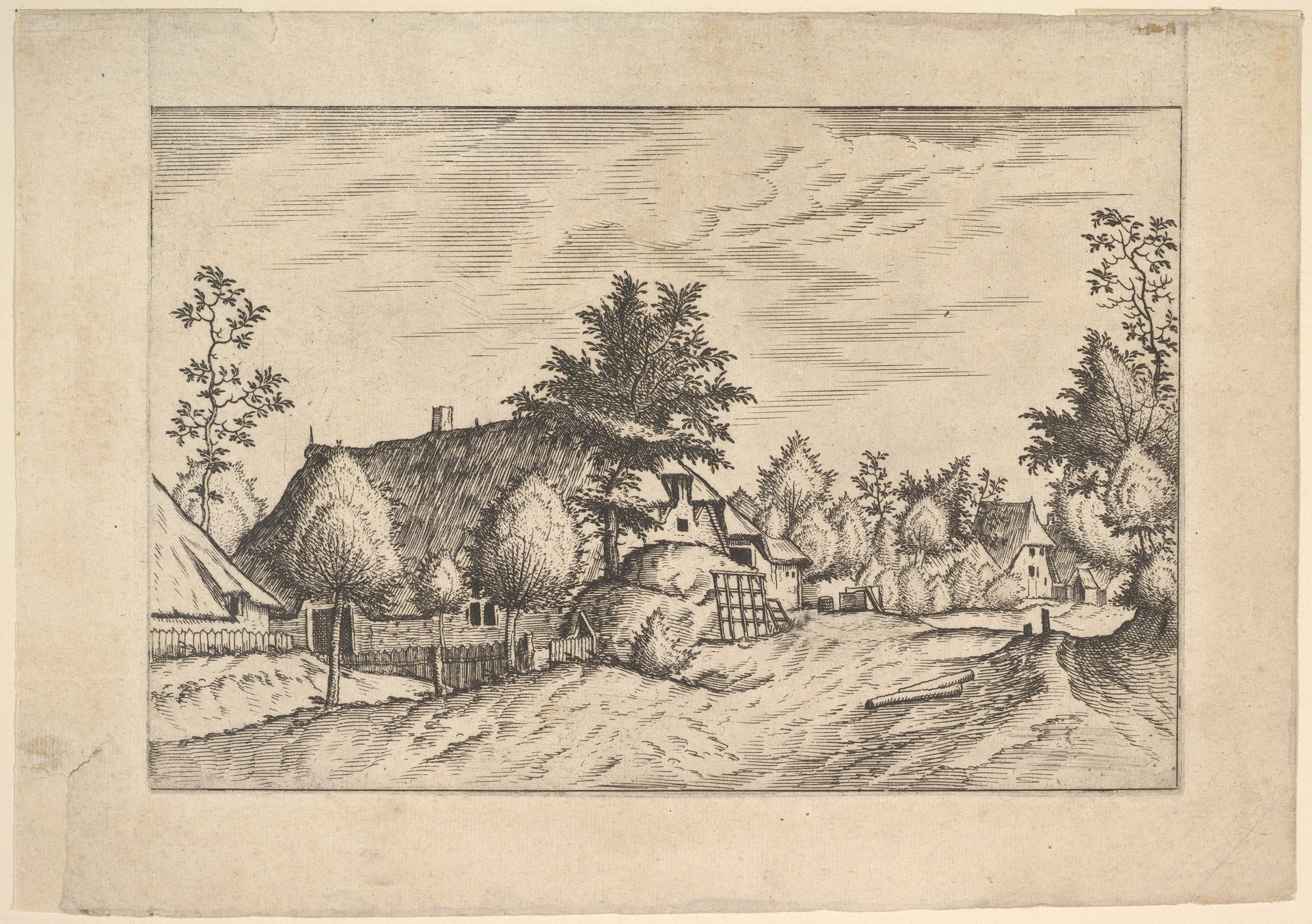 Village Street, hay stacked in front of a farm from Praediorum villarum et rusticarum casularum icones elenoantissimae ad vivum in apre deformatae by Johannes van Doetecum I