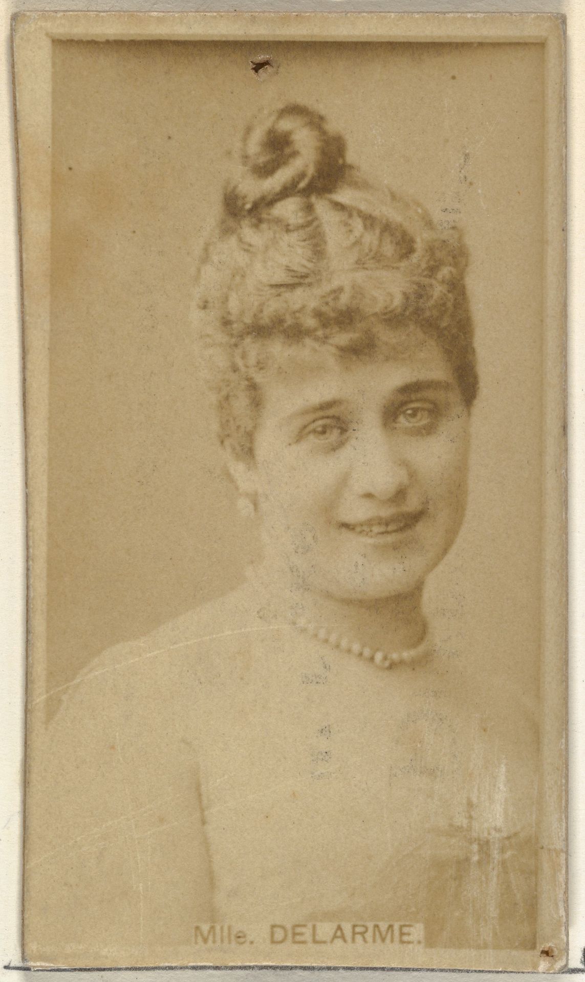 Mlle. Delarme, from the Actors and Actresses series (N145-8) issued by Duke Sons & Co. to promote Duke Cigarettes by W. Duke, Sons & Co.