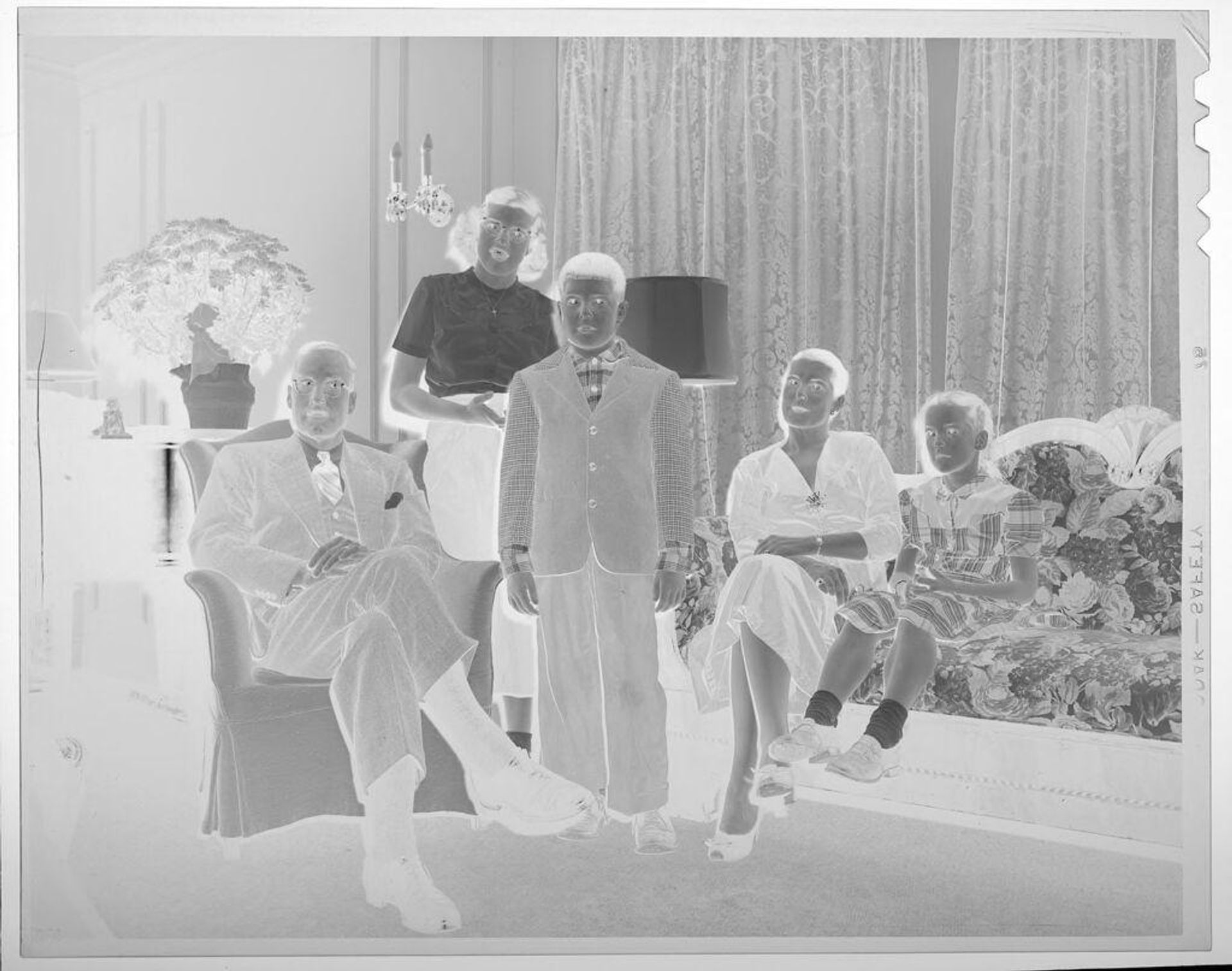 Untitled (family portrait in living room) by Lucian and Mary Brown