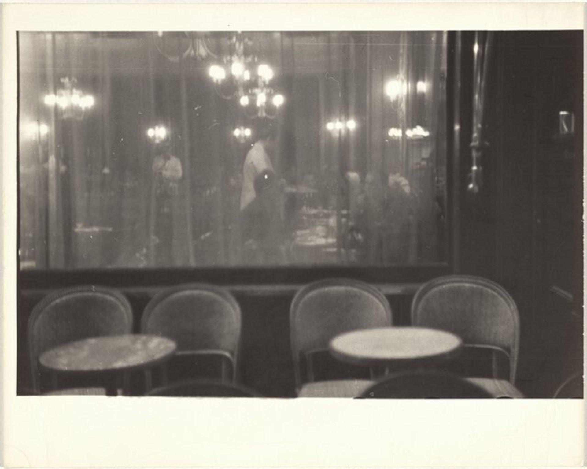 Café at night, Paris by Robert Frank
