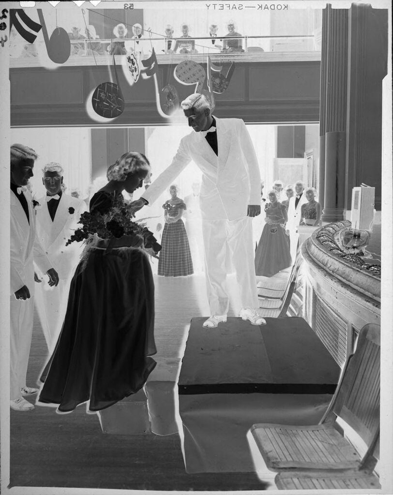 Untitled (young man and woman walking onto stage) by Robert Burian