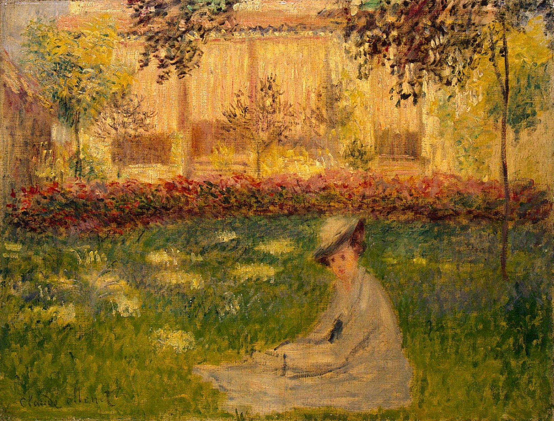 Woman in a Garden by Claude Monet