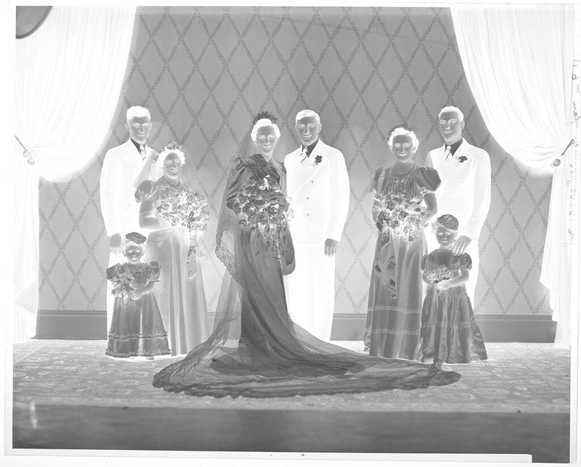 Untitled (bridal party portrait in studio) by John Deusing