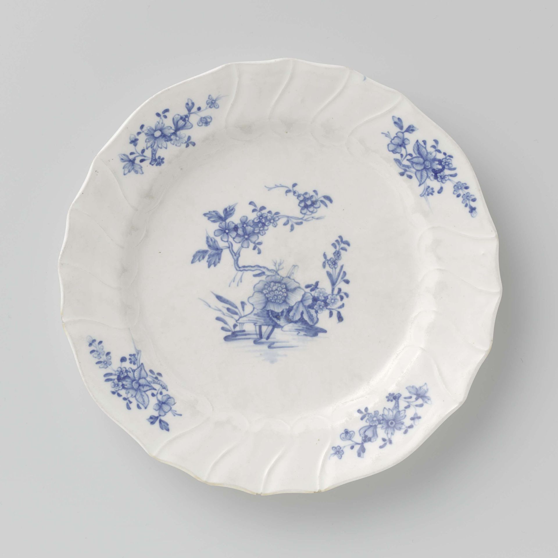 Plate with flowering plants and flower sprays by Doornik