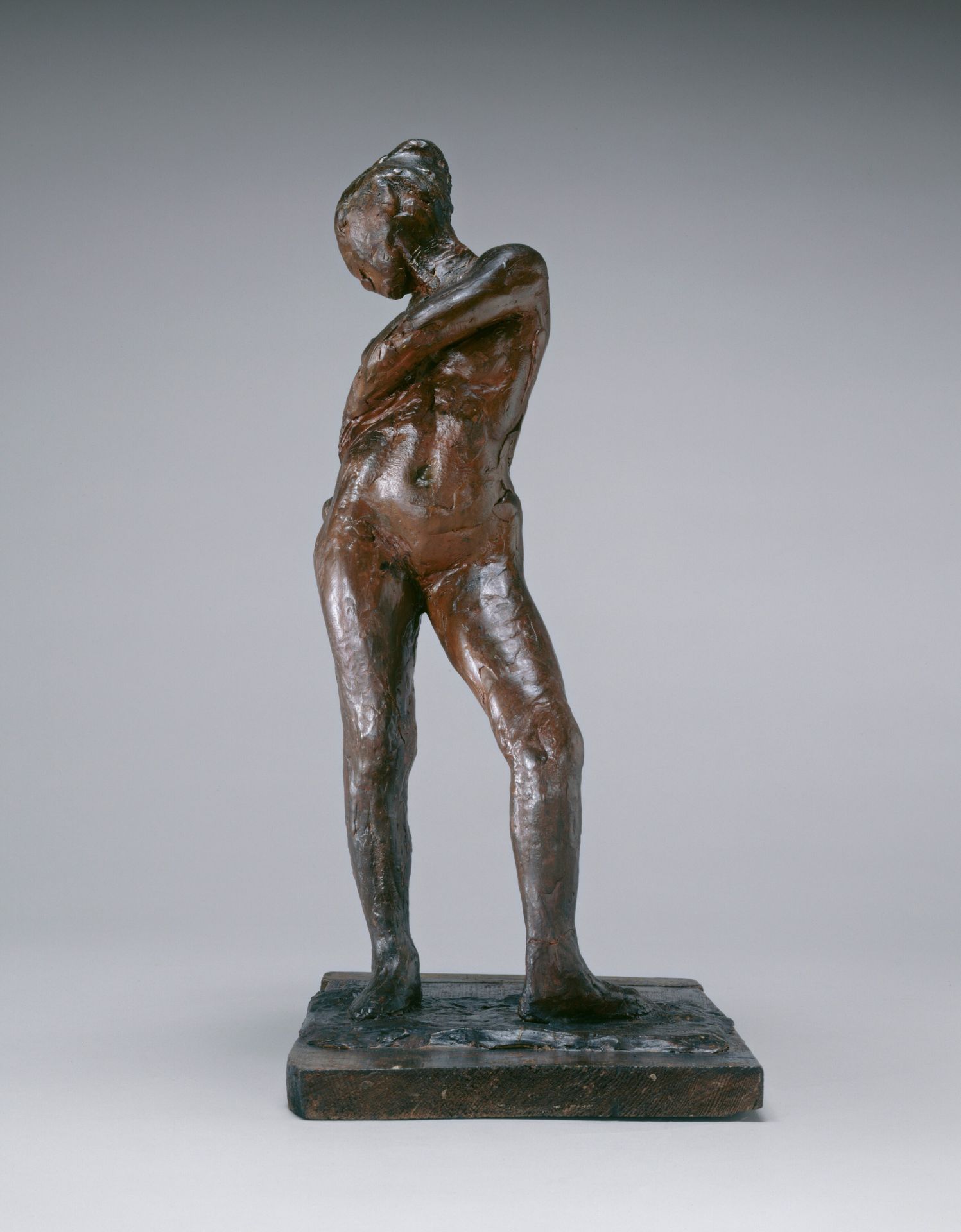 Dancer Fastening the String of Her Tights by Edgar Degas