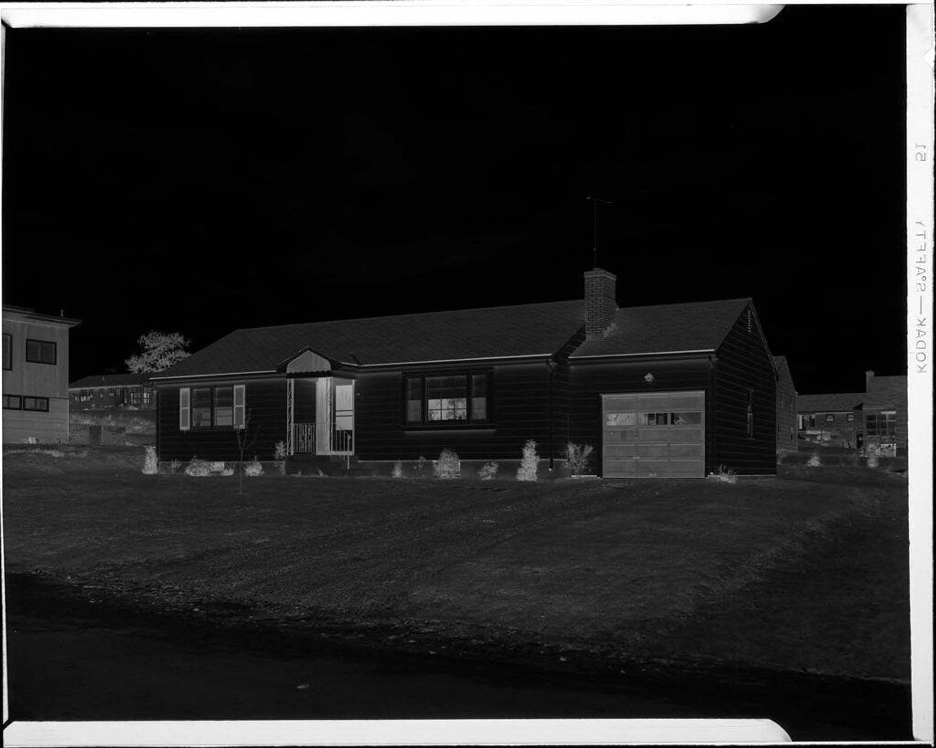 Untitled (exterior of one story house) by Robert Burian