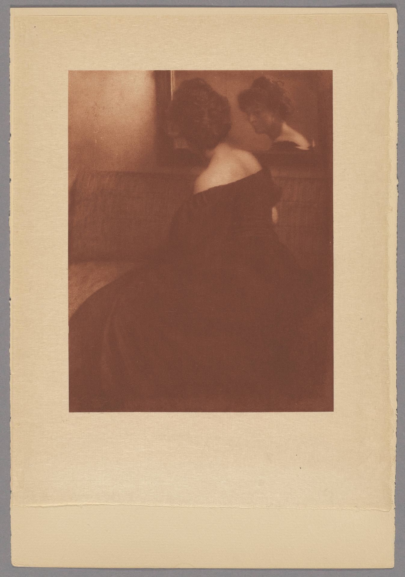 Lady in front of the mirror by Heinrich Kuhn