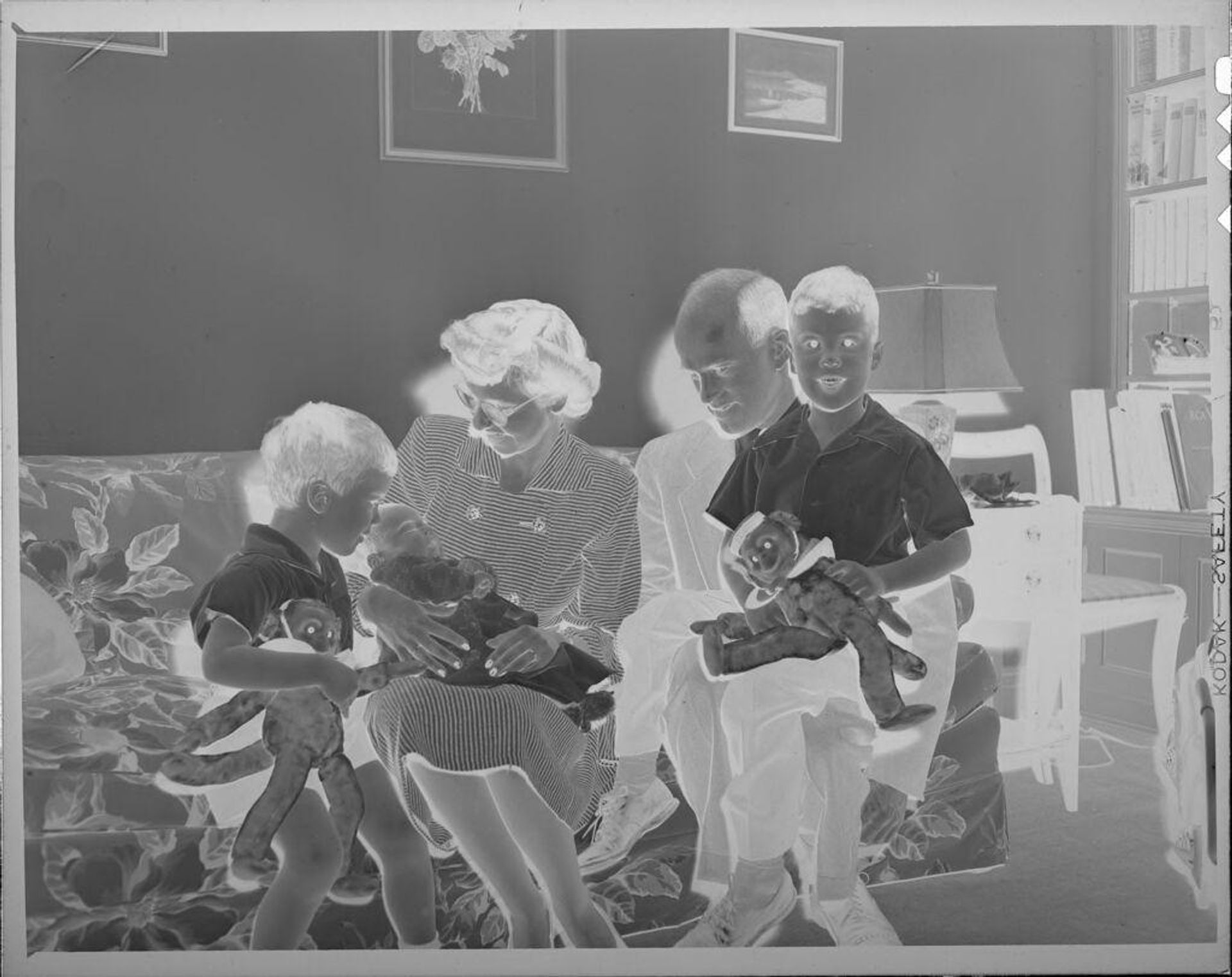 Untitled (family on couch) by Lucian and Mary Brown