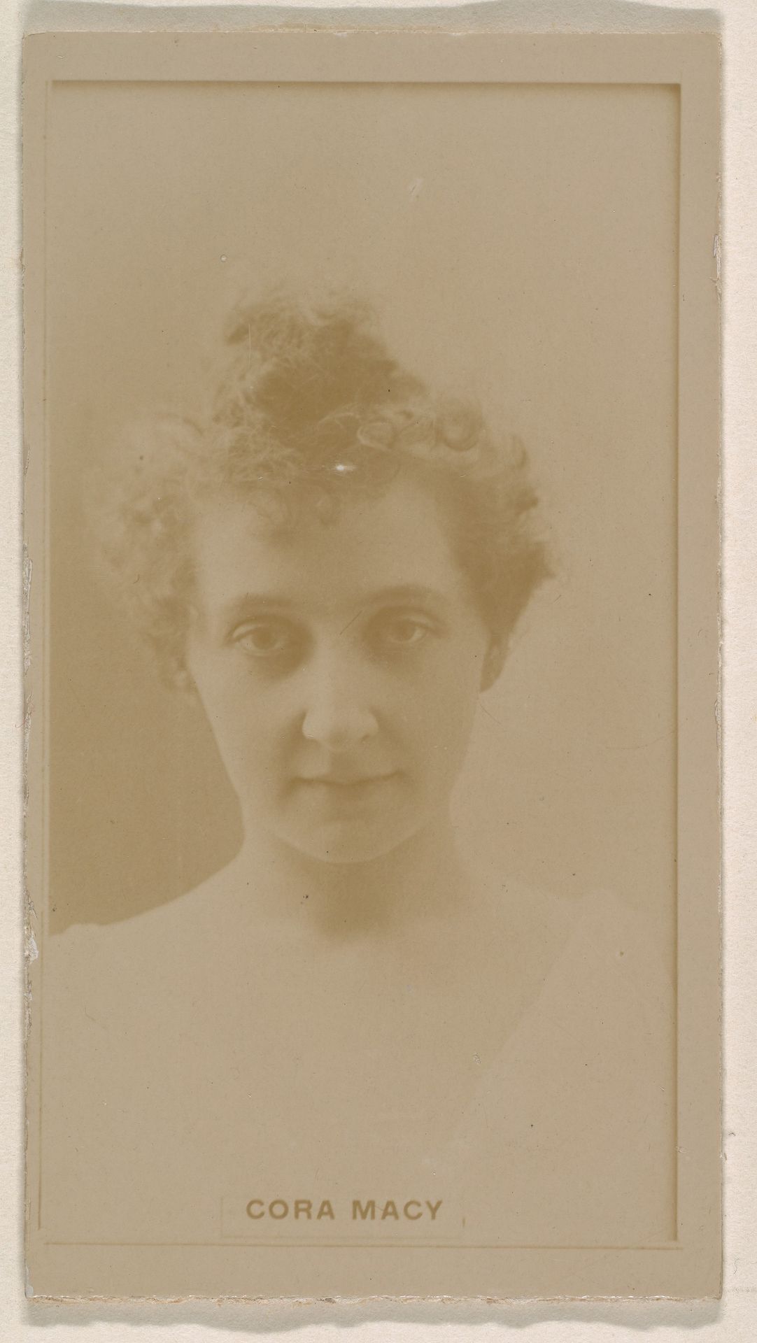Cora Macy, from the Actresses series (N245) issued by Kinney Brothers to promote Sweet Caporal Cigarettes by Kinney Brothers Tobacco Company