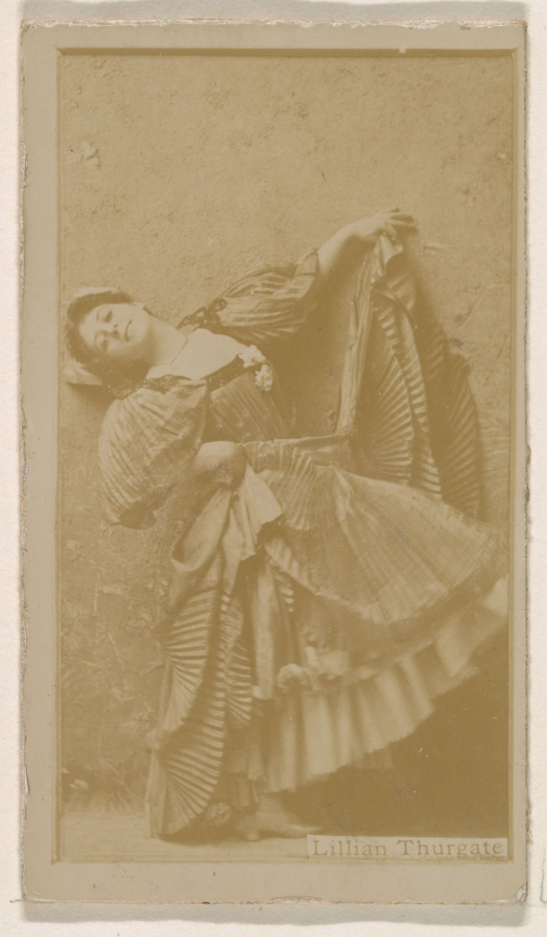 Lillian Thurgate, from the Actresses series (N245) issued by Kinney Brothers to promote Sweet Caporal Cigarettes by Kinney Brothers Tobacco Company
