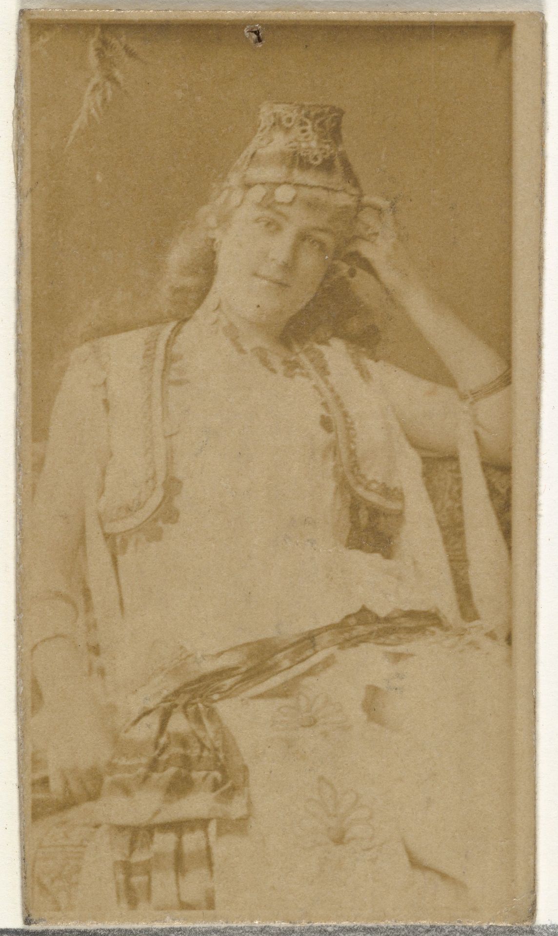[Actress wearing exotic costume], from the Actors and Actresses series (N145-8) issued by Duke Sons & Co. to promote Duke Cigarettes by W. Duke, Sons & Co.