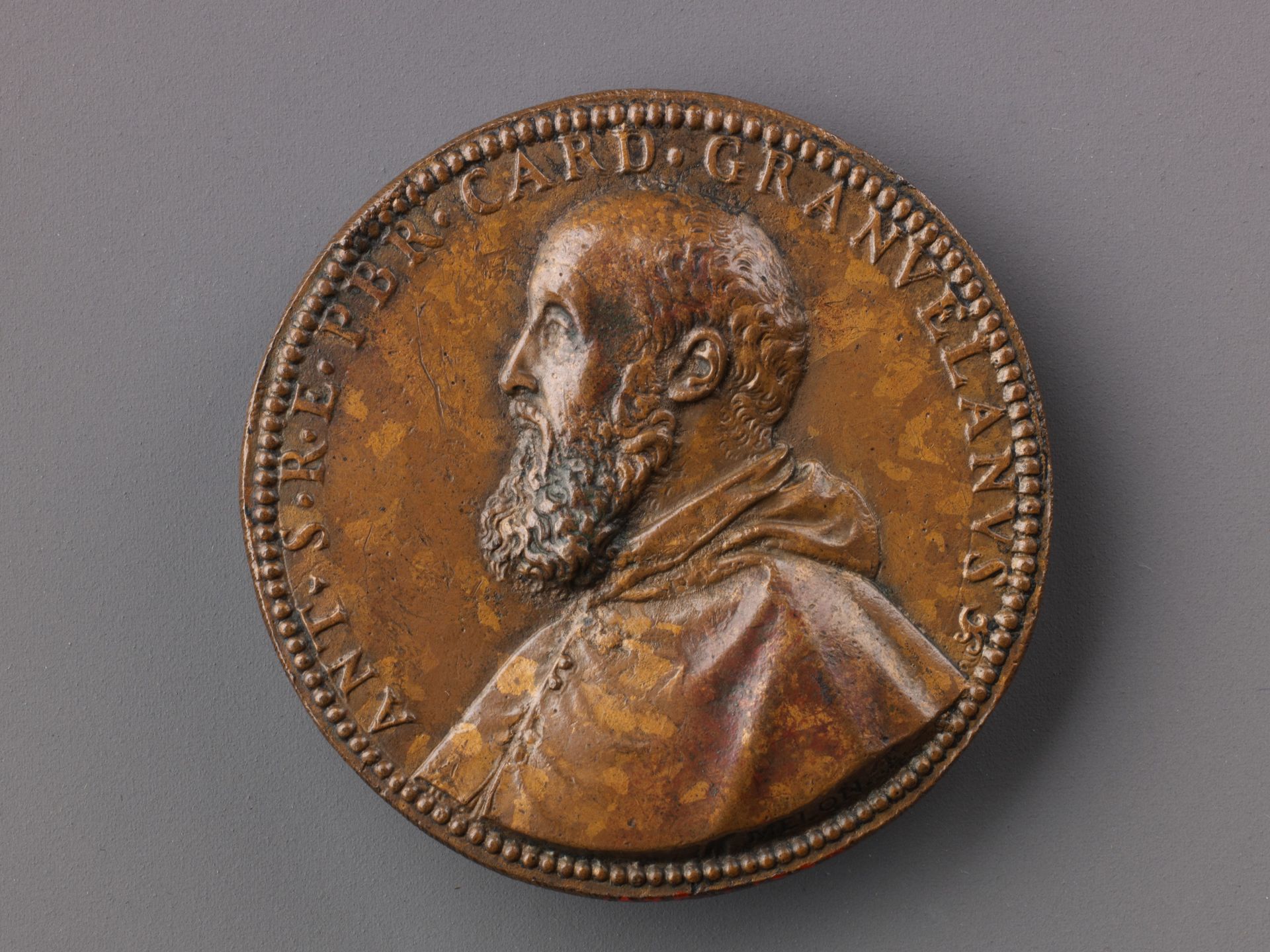 Portrait medal of Antoine Perrenot Granvelle (obverse); Don Juan of Austria Receiving the Standard from Granvelle (reverse) by Giovanni V. Melon