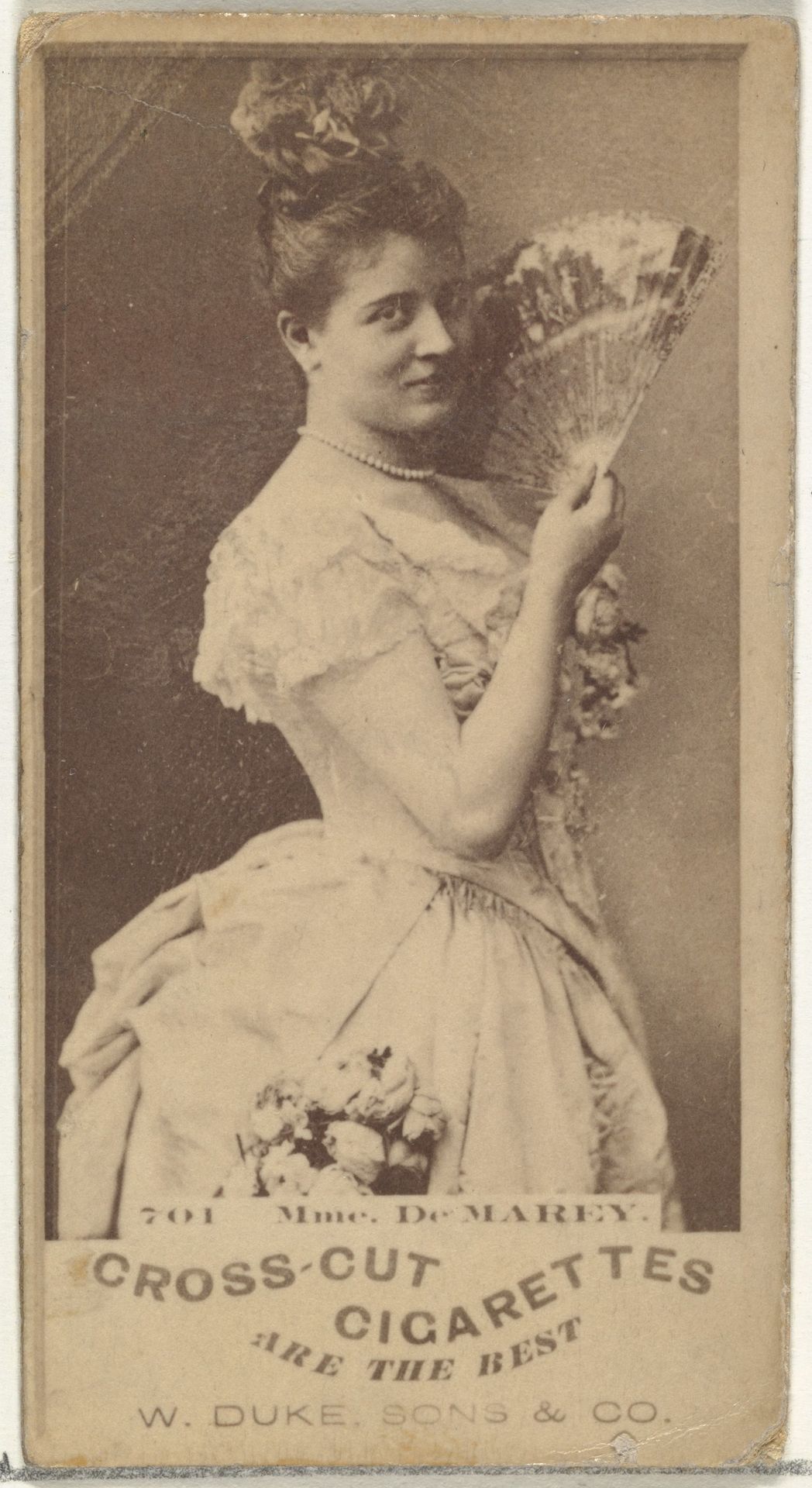Card Number 701, Mme. De Marey, from the Actors and Actresses series (N145-3) issued by Duke Sons & Co. to promote Cross Cut Cigarettes by W. Duke, Sons & Co.