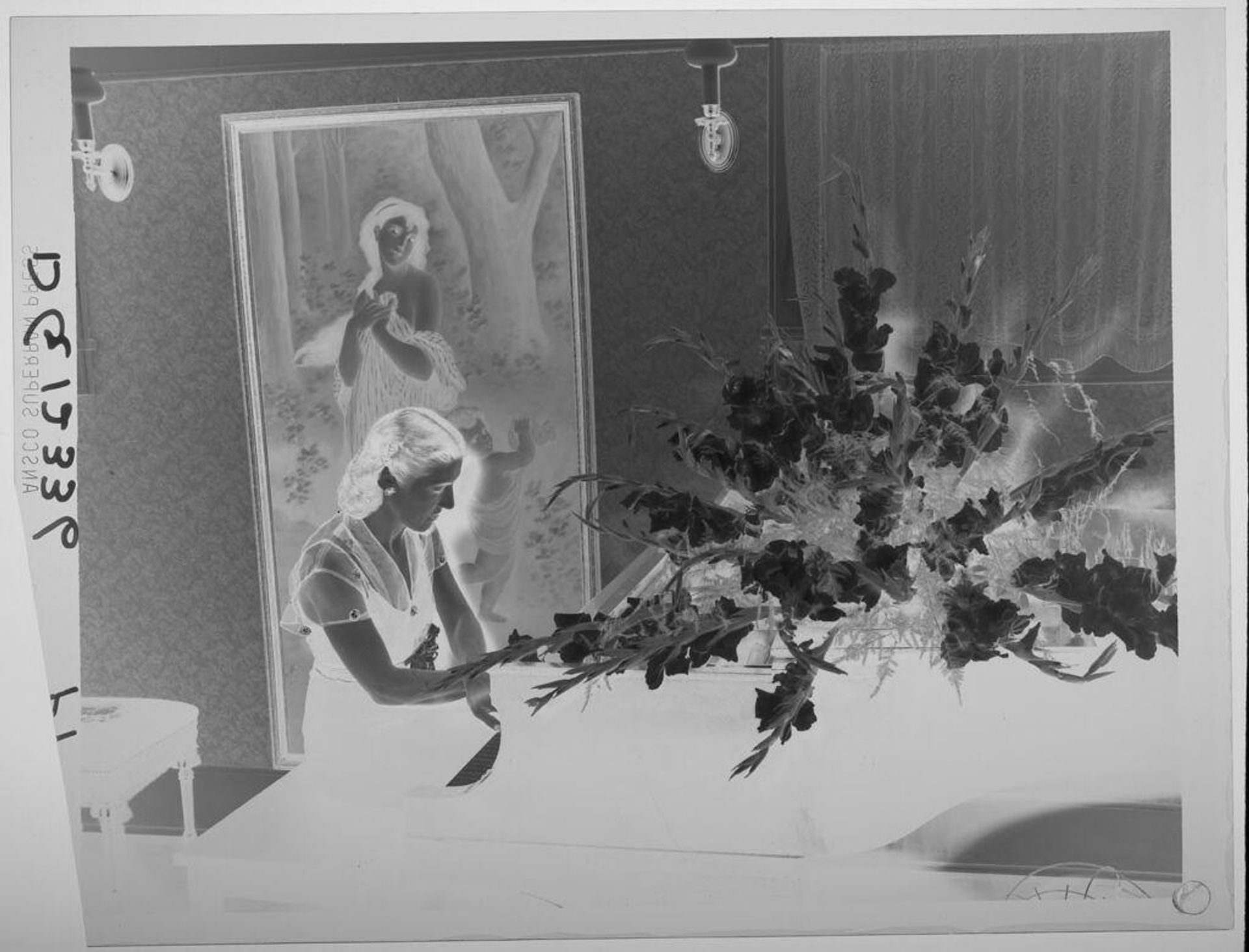 Untitled (woman playing piano, large painting of woman in forest behind her) by Paul Gittings