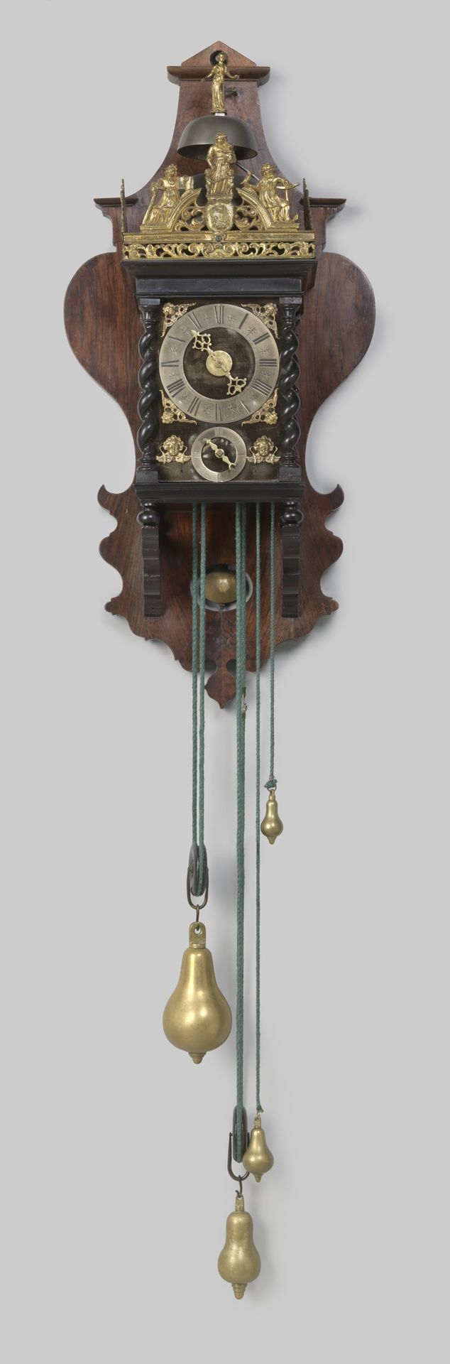 Koperen gewicht horende bij een wandklok by D. (uurwerkmaker) Engel