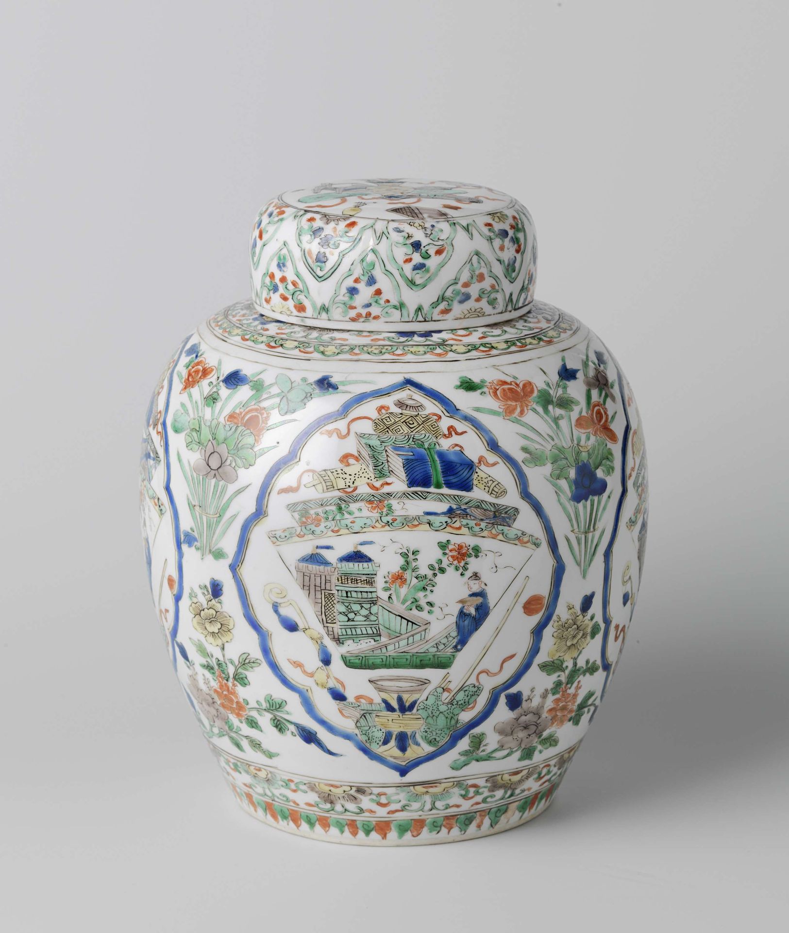 Ovoid covered jar with flowering plants and antiquities by Anonymous