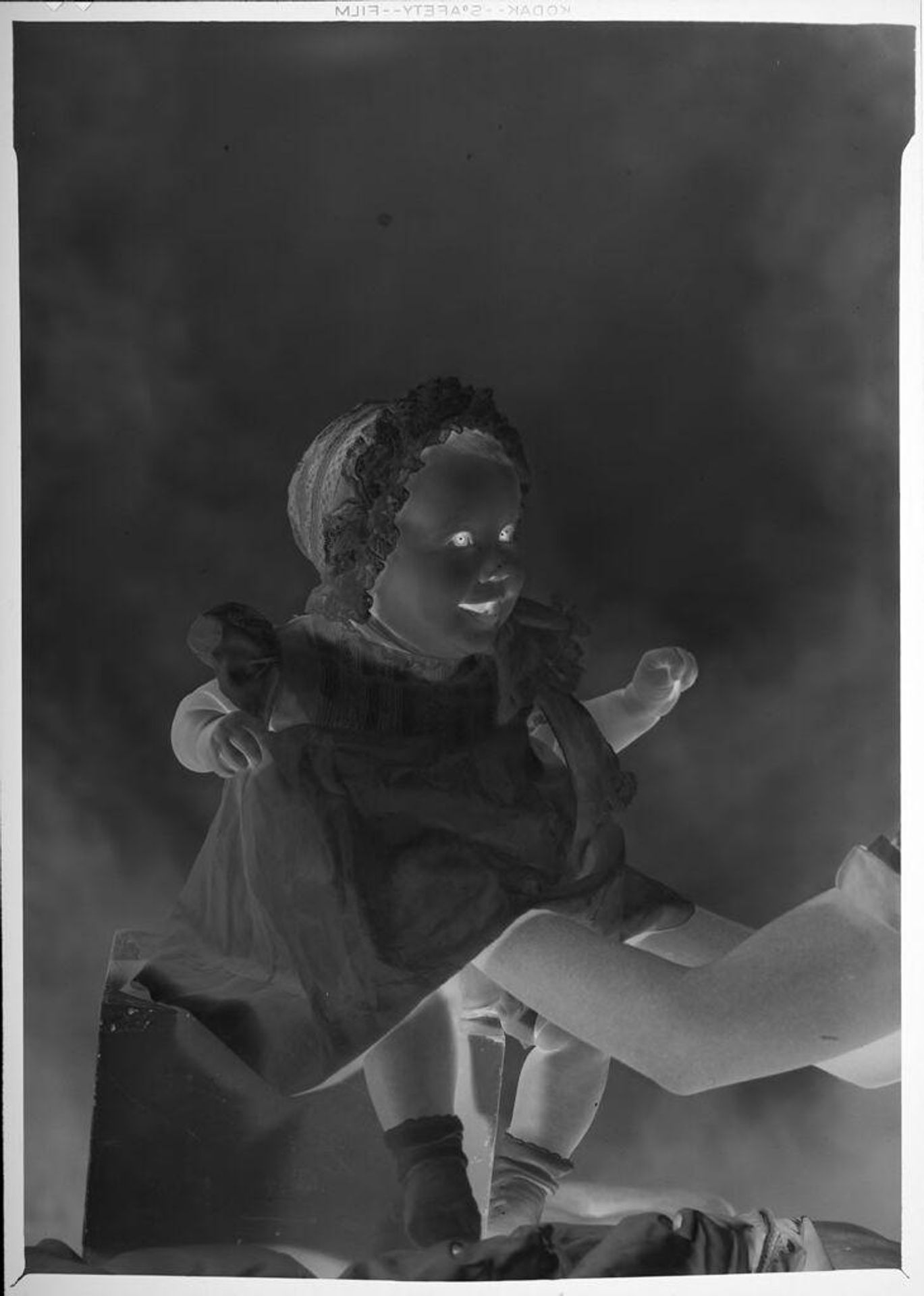 Untitled (babe being prepared for portrait) by Eugenie Stoll