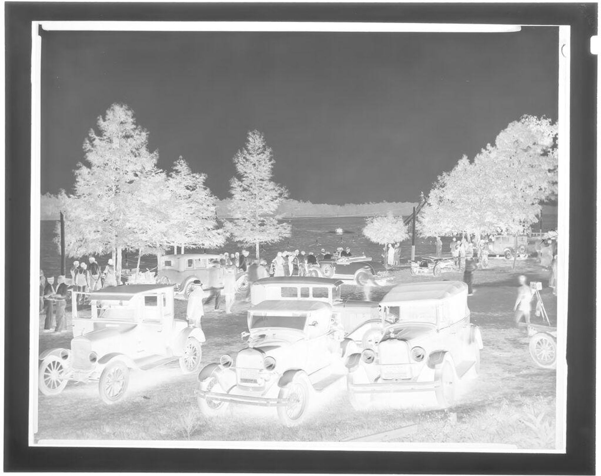 Untitled (cars and people at beachfront, Tuscanoro Beach) by Hamblin Studio
