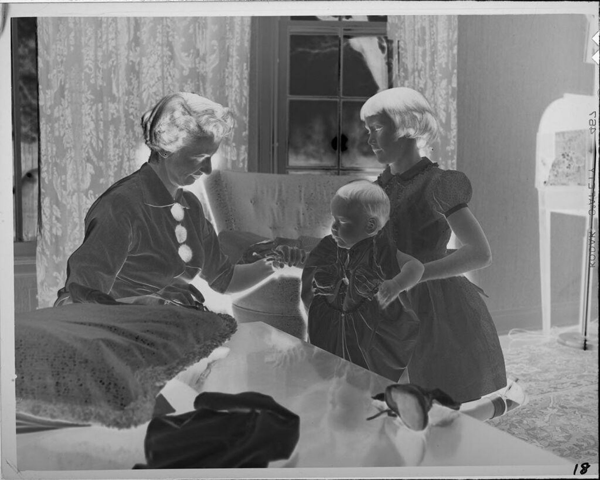 Untitled (woman and girl with baby) by Lucian and Mary Brown