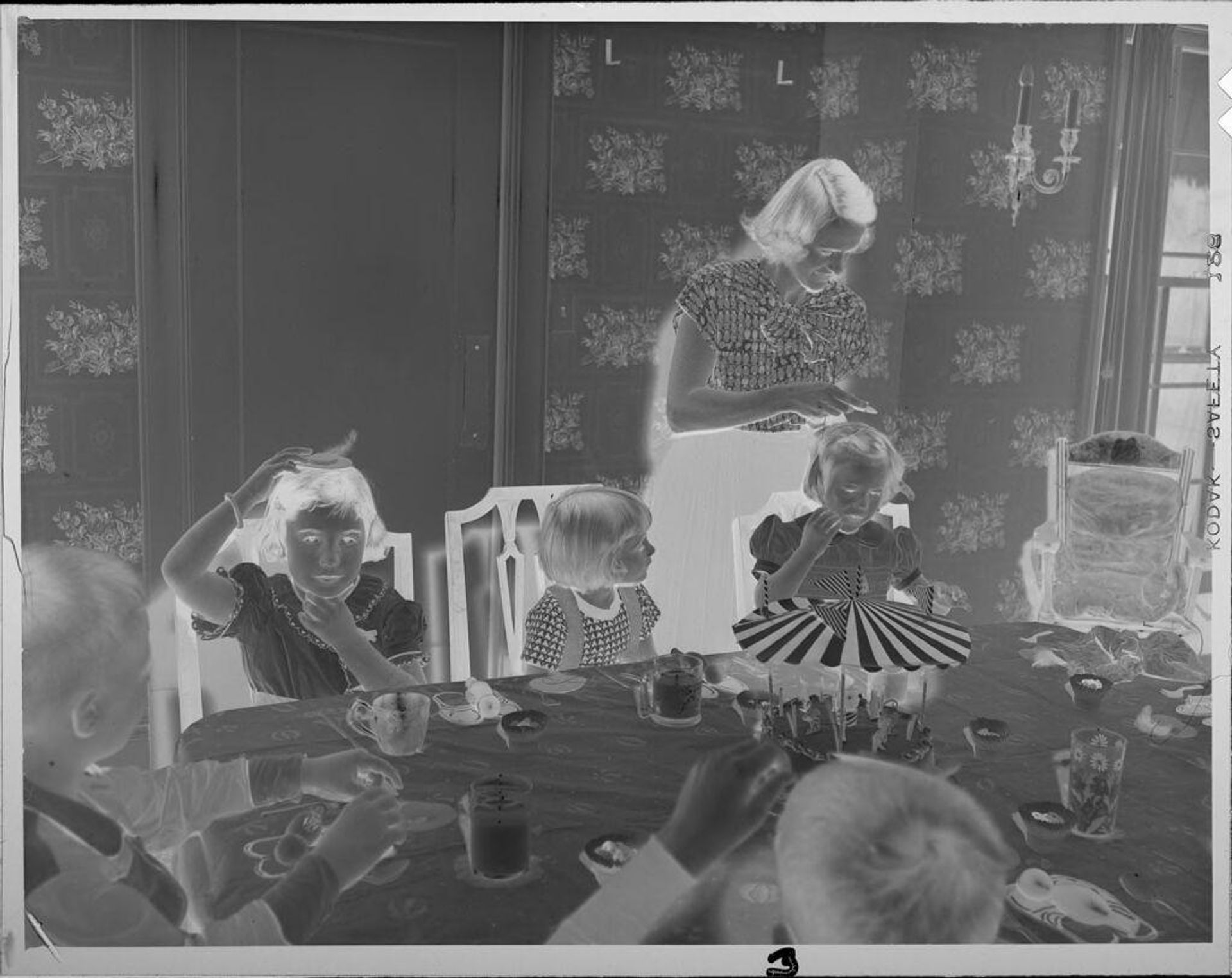Untitled (children at birthday party) by Lucian and Mary Brown