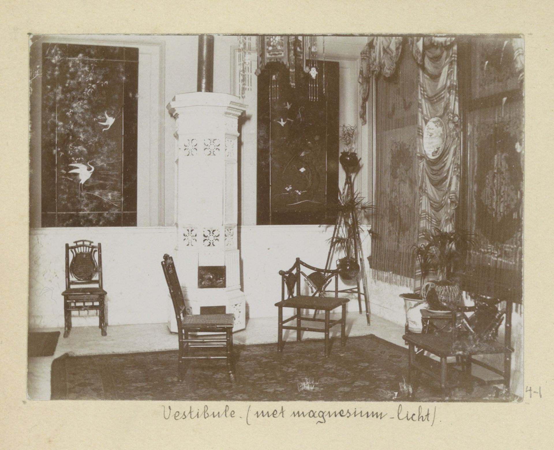 Vestibule met enkele stoelen en een kachel by Hendrik Herman van den Berg